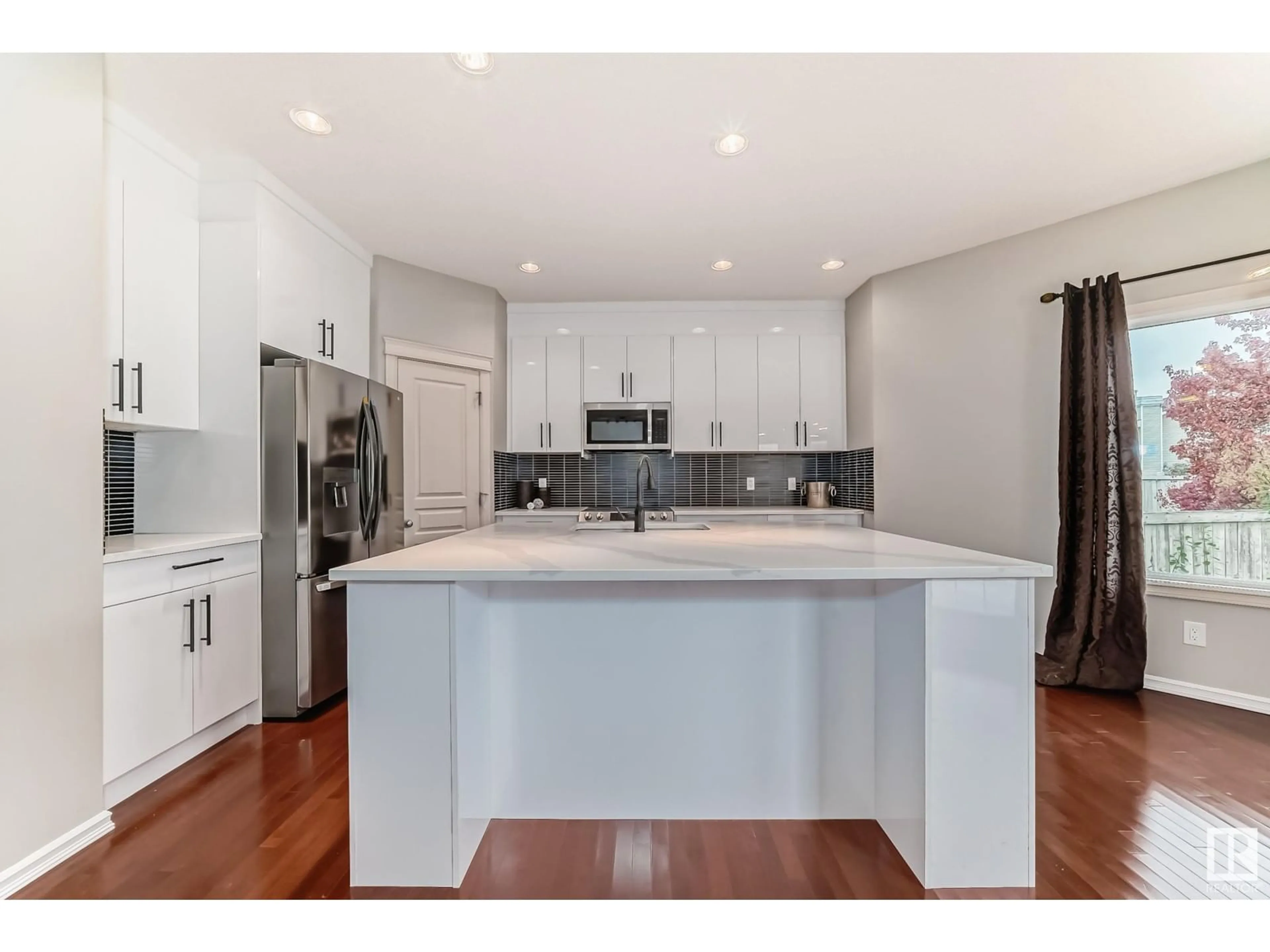 Open concept kitchen, unknown for 203 CALDWELL WY NW, Edmonton Alberta T6M2X2