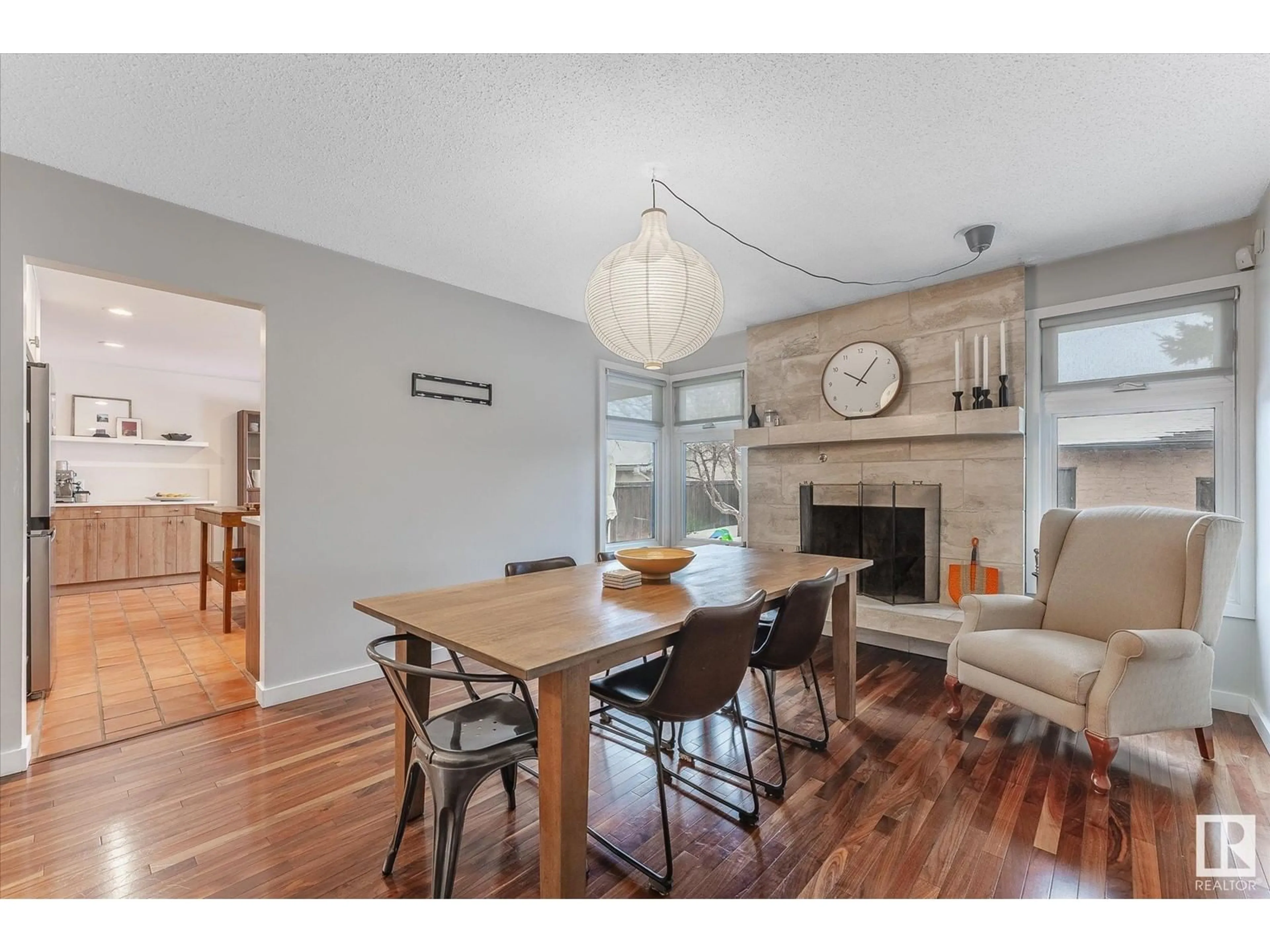 Dining room, wood/laminate floor for 10830 32A AV NW, Edmonton Alberta T6J3B9