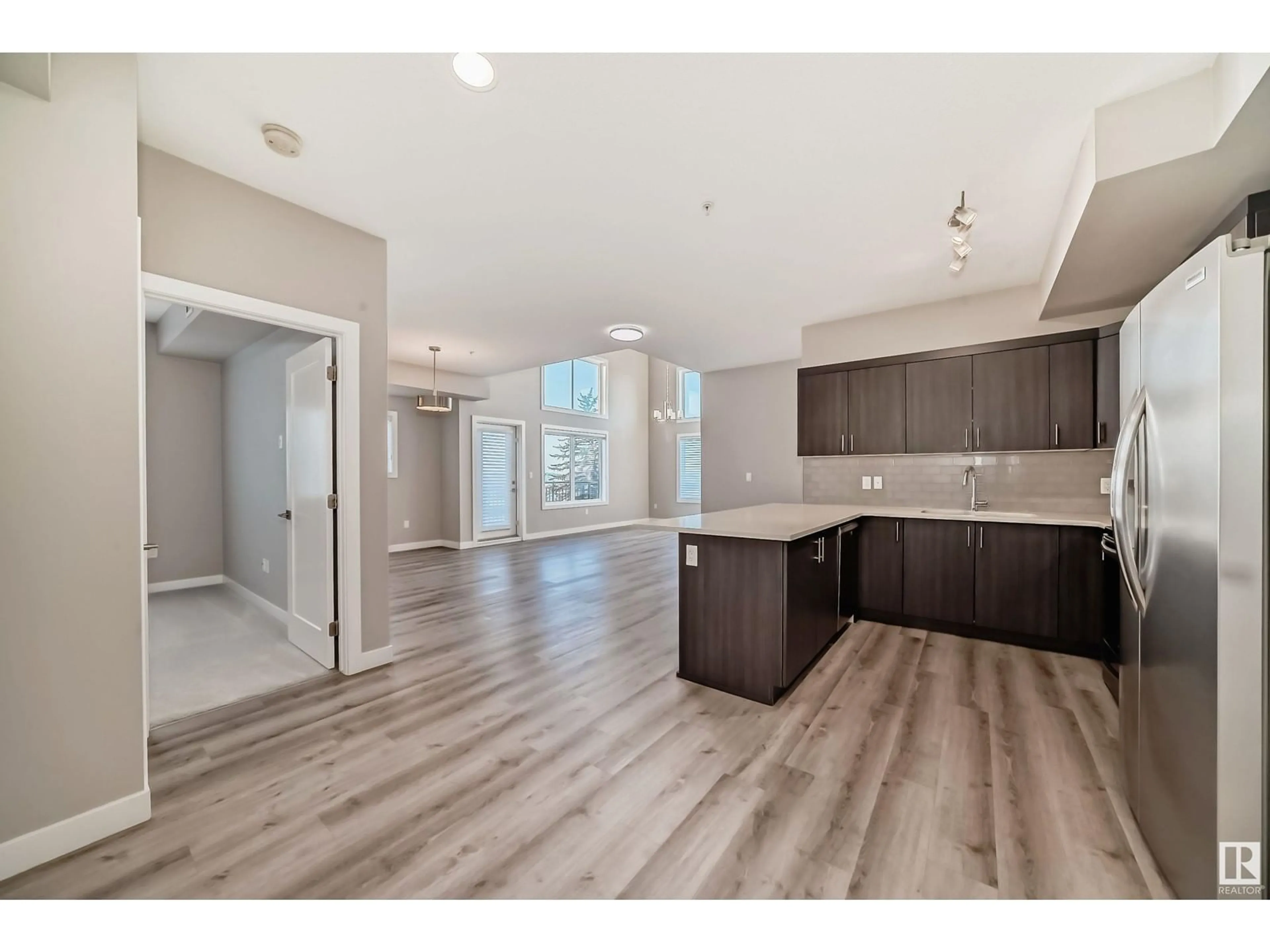 Open concept kitchen, unknown for #434 560 GRIESBACH PARADE PR NW, Edmonton Alberta T5E6X1