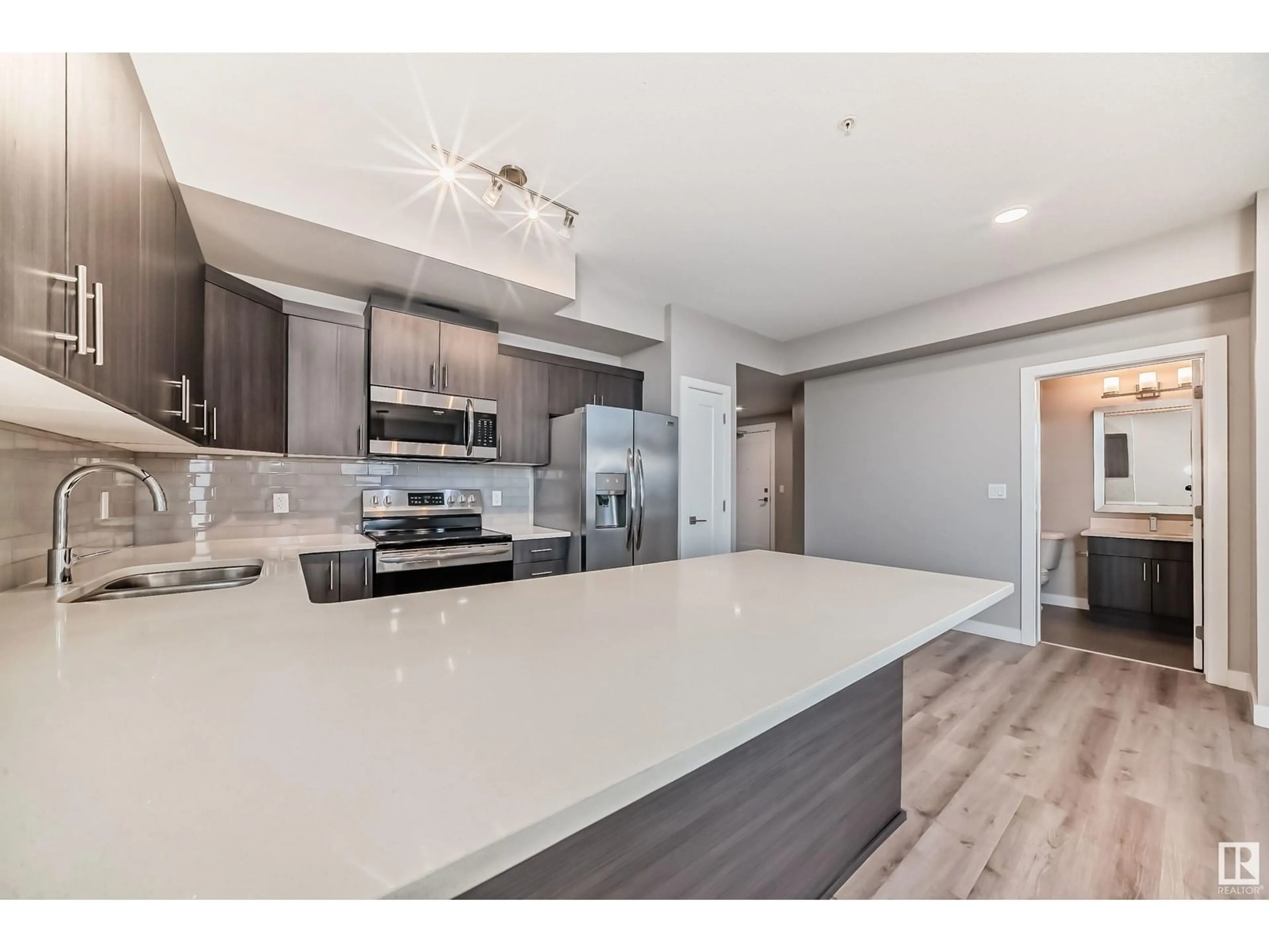 Open concept kitchen, unknown for #434 560 GRIESBACH PARADE PR NW, Edmonton Alberta T5E6X1