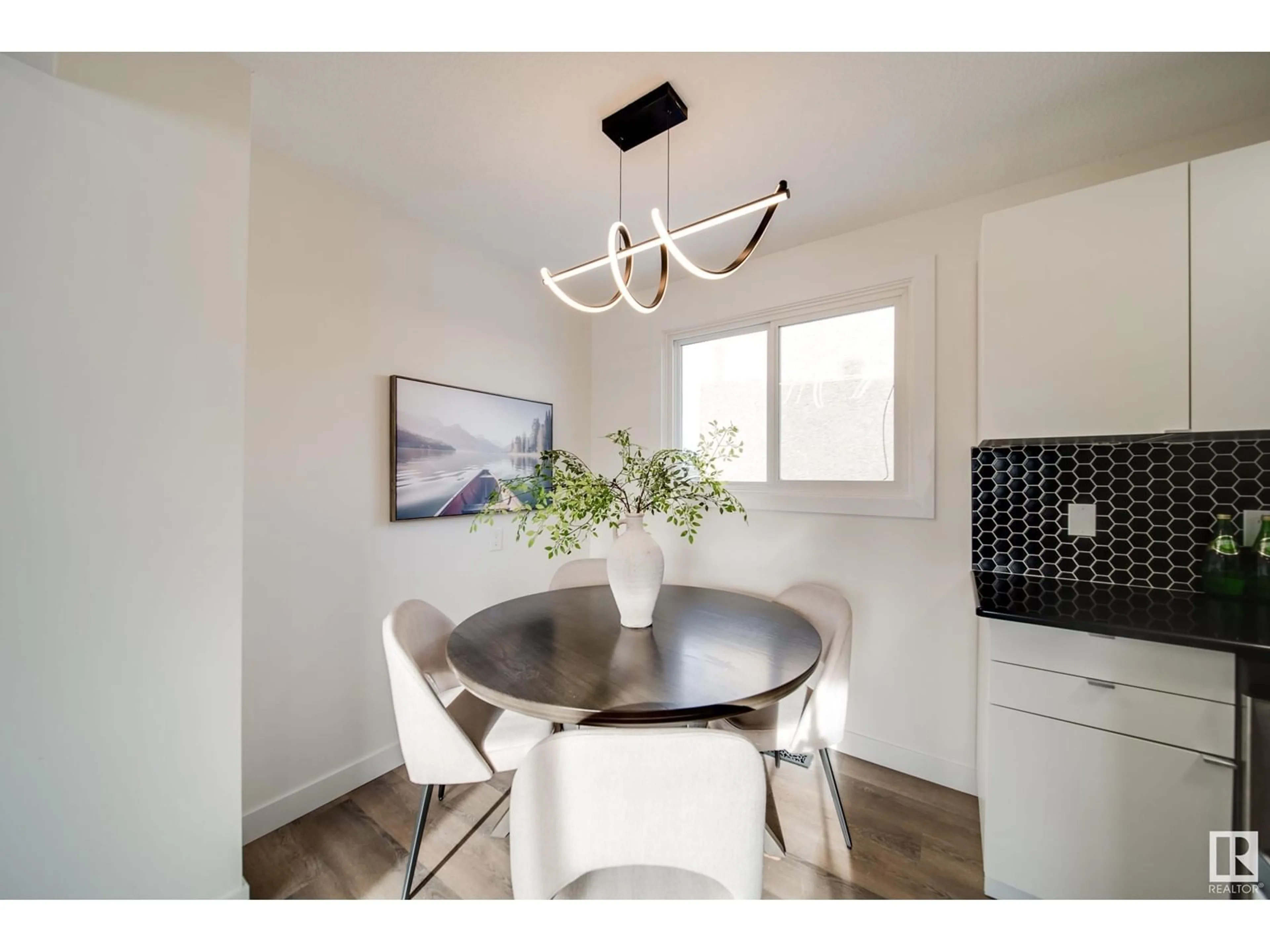 Dining room, wood/laminate floor for 436 HERMITAGE RD NW, Edmonton Alberta T5A3L1