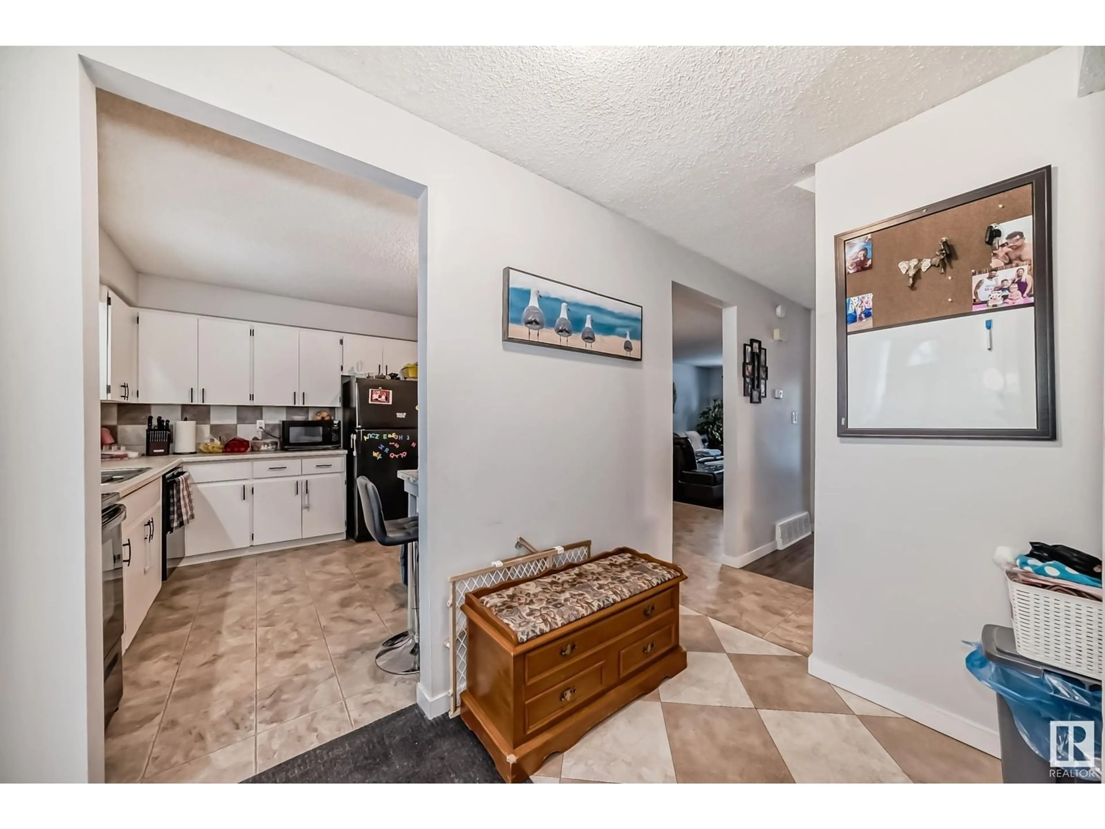 Open concept kitchen, ceramic/tile floor for 13067 34 ST NW, Edmonton Alberta T5A3K3