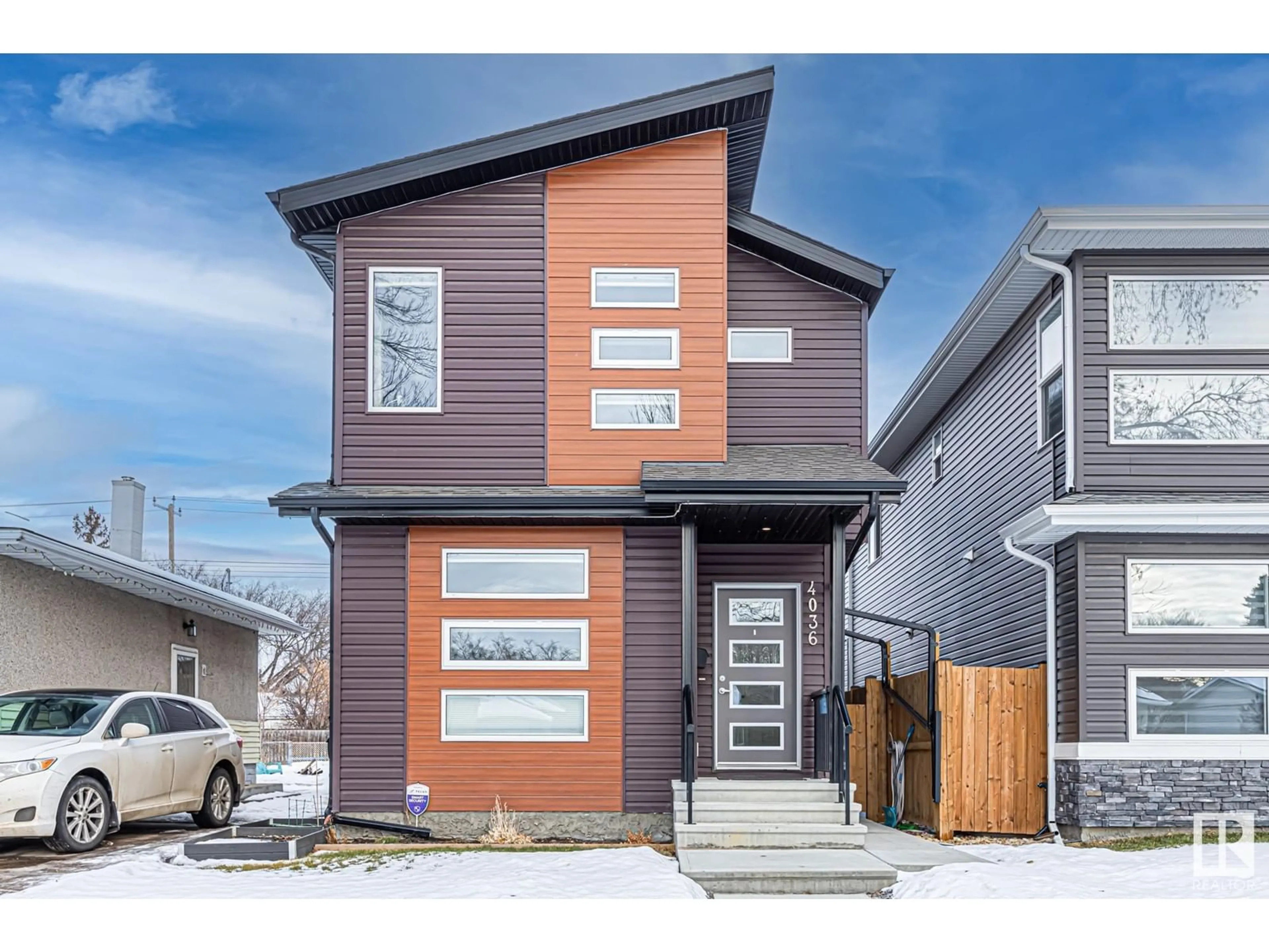 Home with vinyl exterior material, street for 4036 113 AV NW, Edmonton Alberta T5W0R3