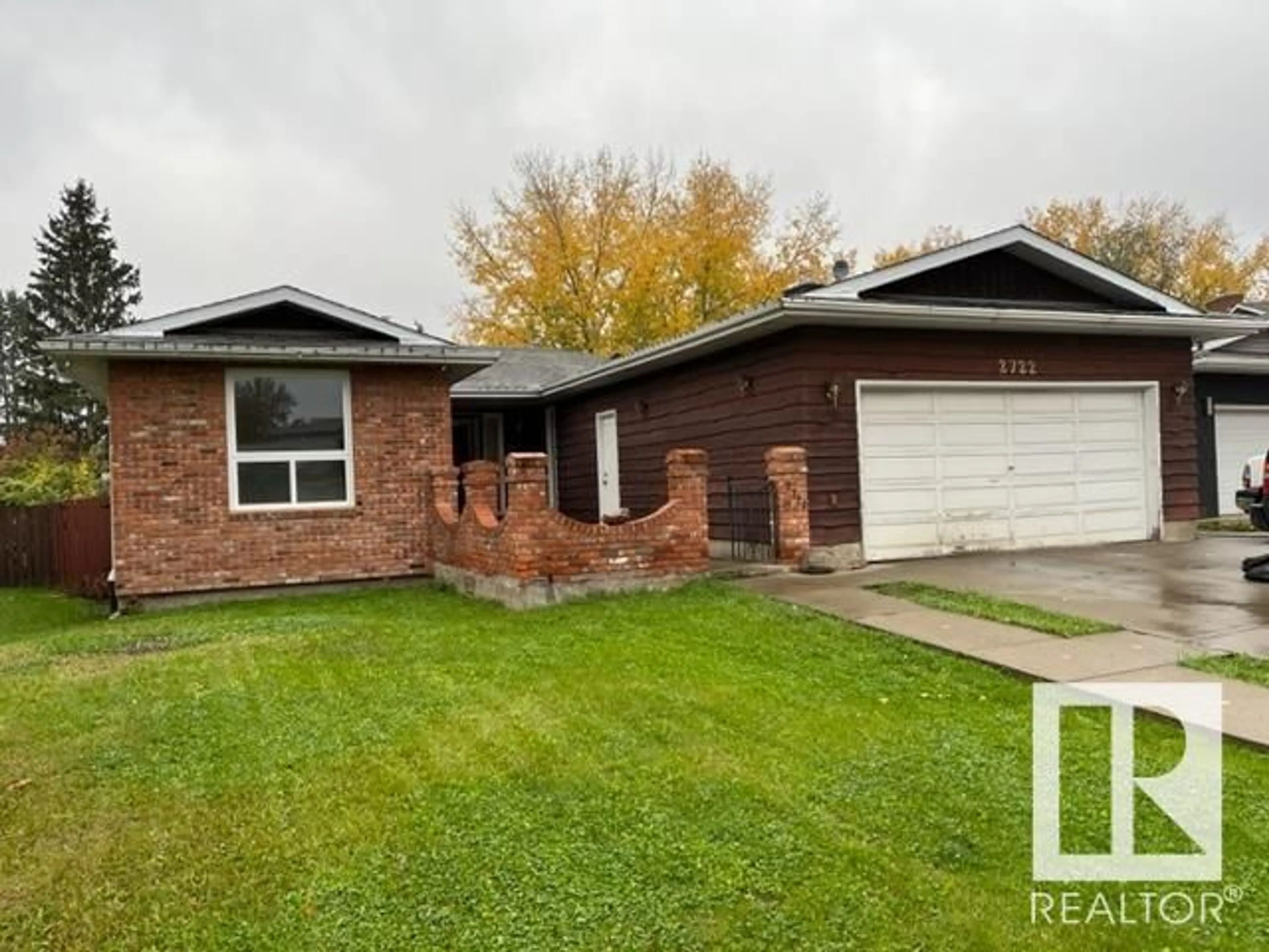 Home with brick exterior material, street for 2722 104A ST NW, Edmonton Alberta T6J4C3