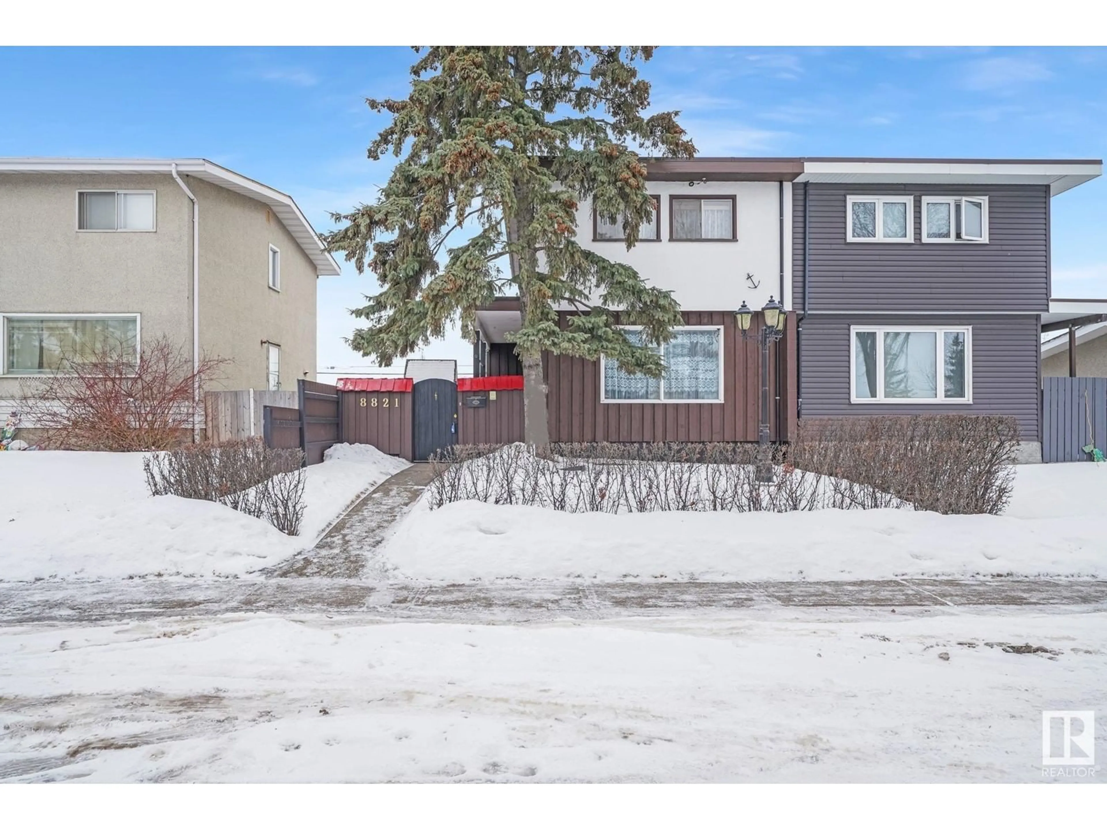 A pic from outside/outdoor area/front of a property/back of a property/a pic from drone, street for 8821 137 AV NW, Edmonton Alberta T5E1Y3