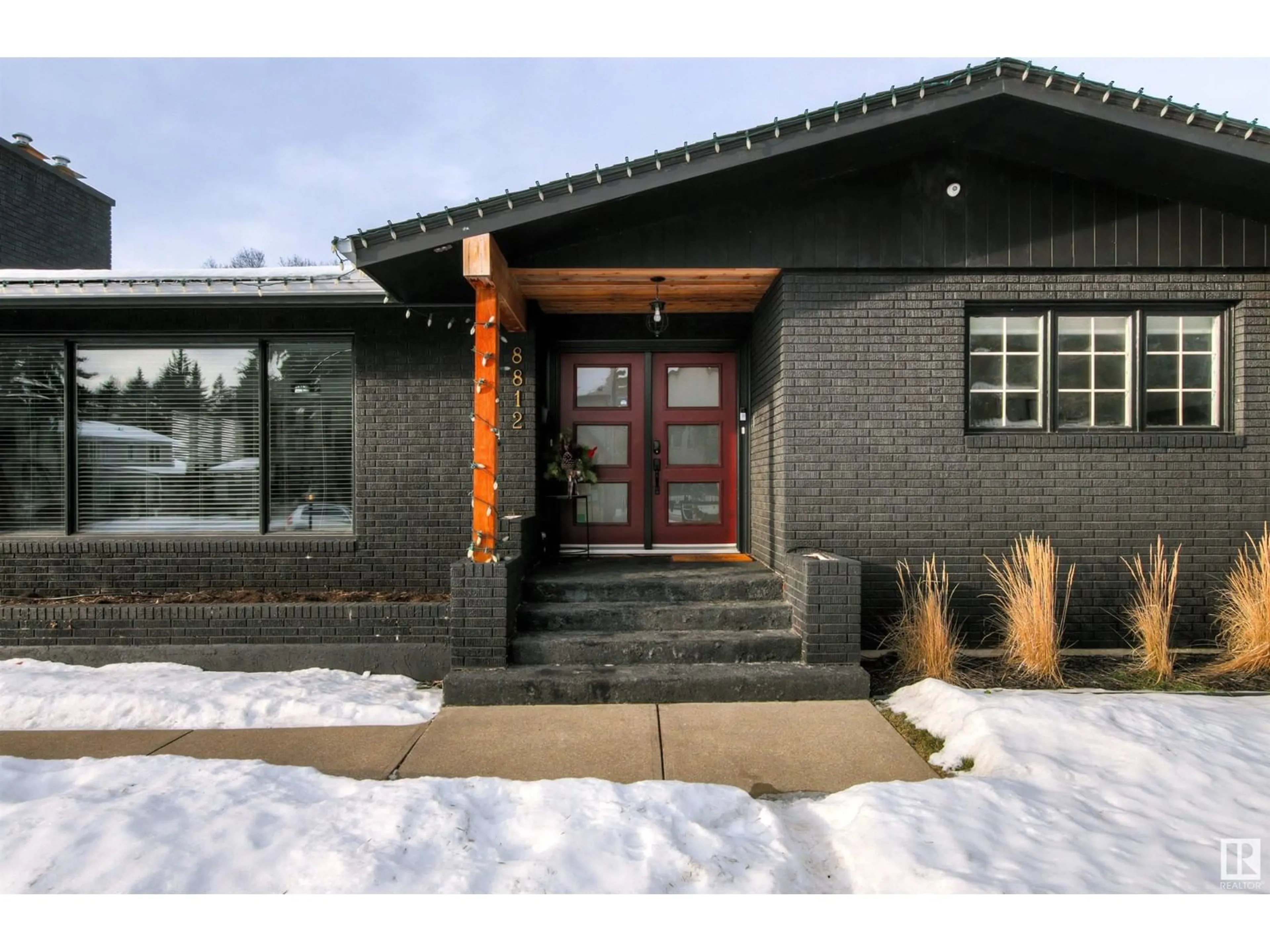 Home with brick exterior material, street for 8812 140 ST NW, Edmonton Alberta T5R0J2