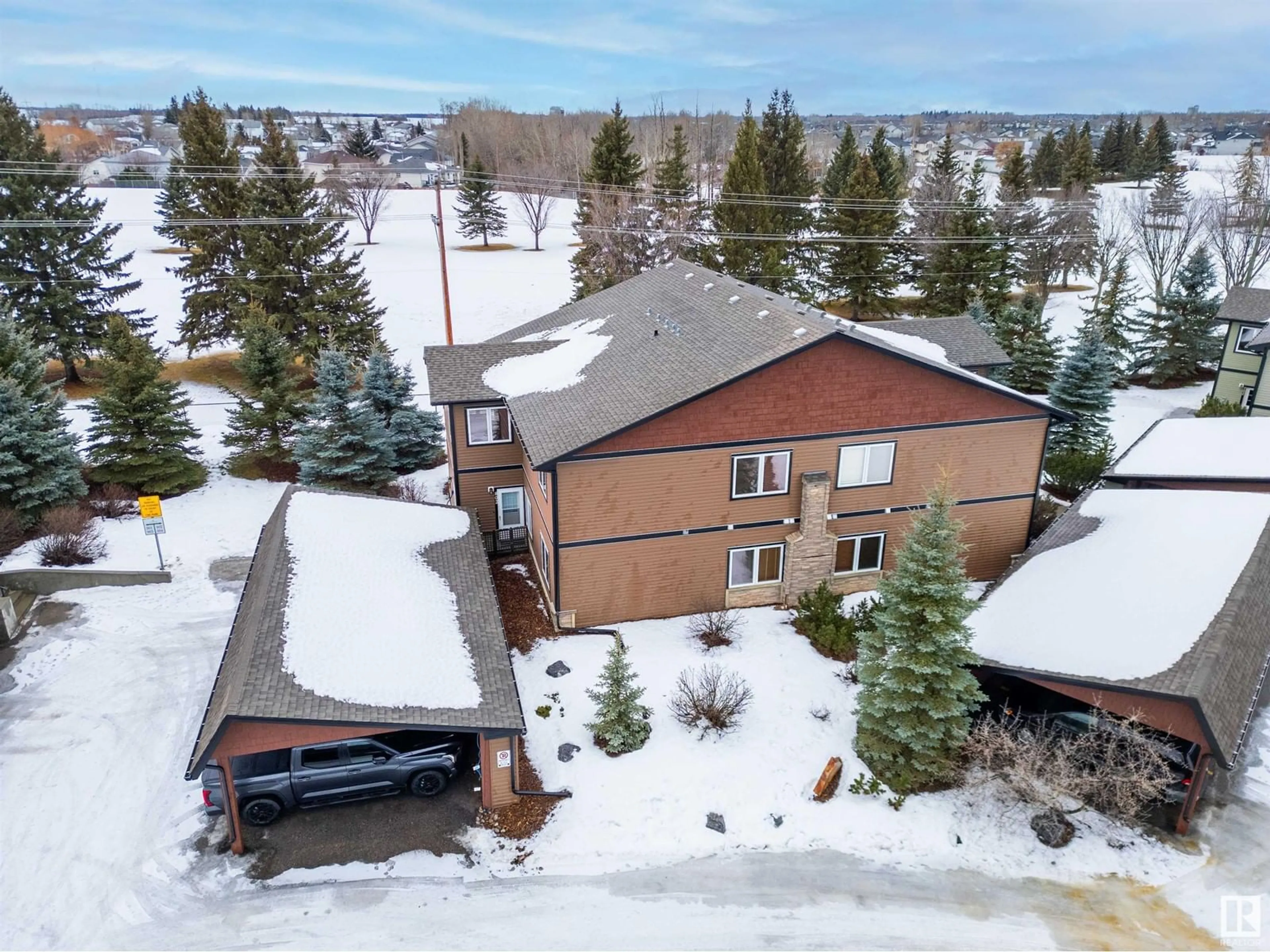 A pic from outside/outdoor area/front of a property/back of a property/a pic from drone, mountain view for 802 GRAYBRIAR GR, Stony Plain Alberta T7Z0G1