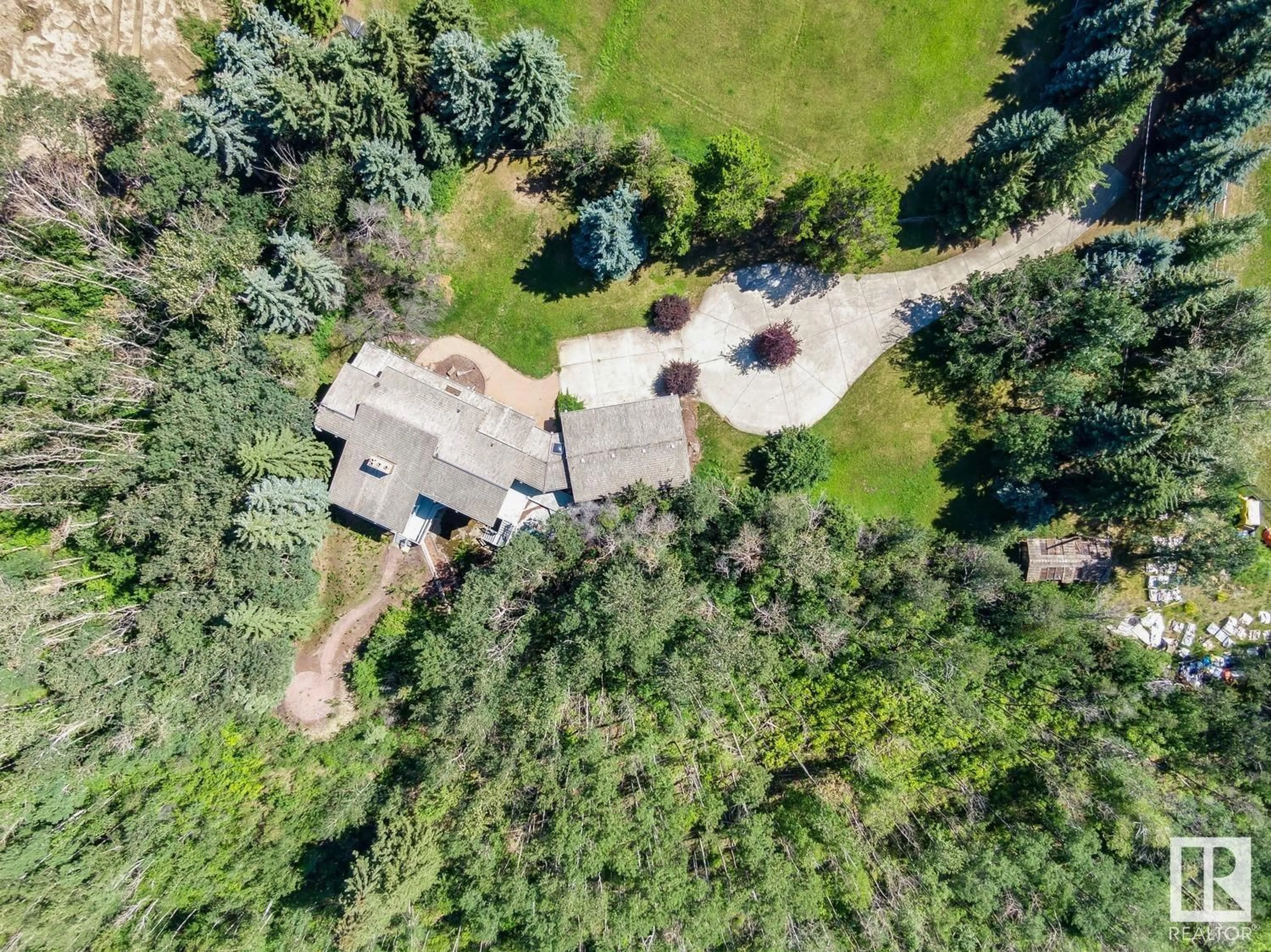 A pic from outside/outdoor area/front of a property/back of a property/a pic from drone, forest/trees view for 18420 8A AV SW, Edmonton Alberta T6W1A5