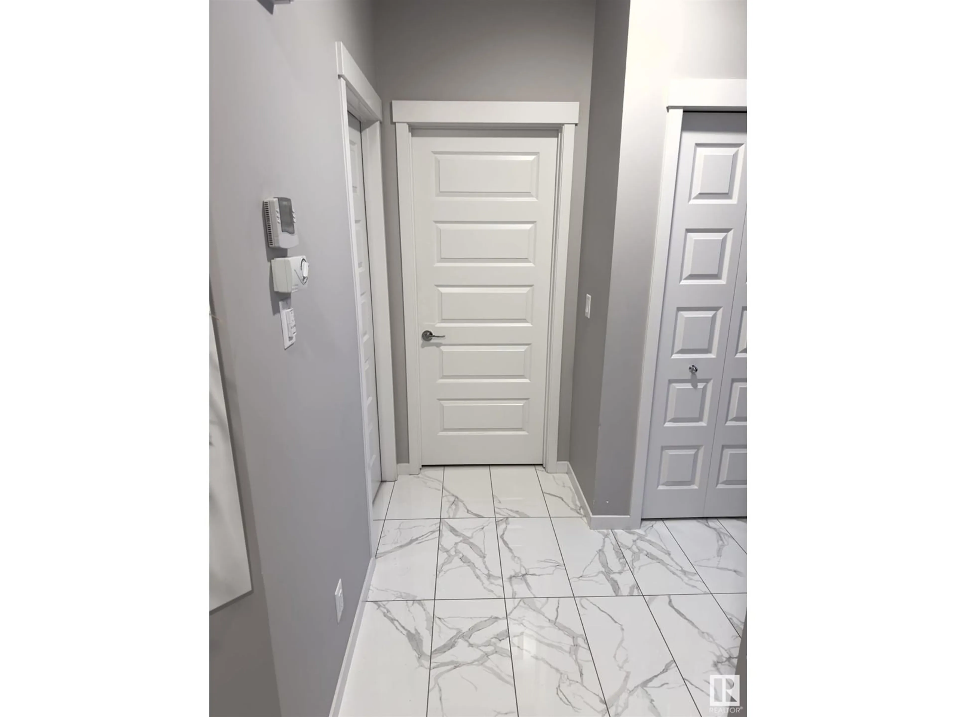 Indoor entryway for 5225 22A AV SW, Edmonton Alberta T6X2Y1