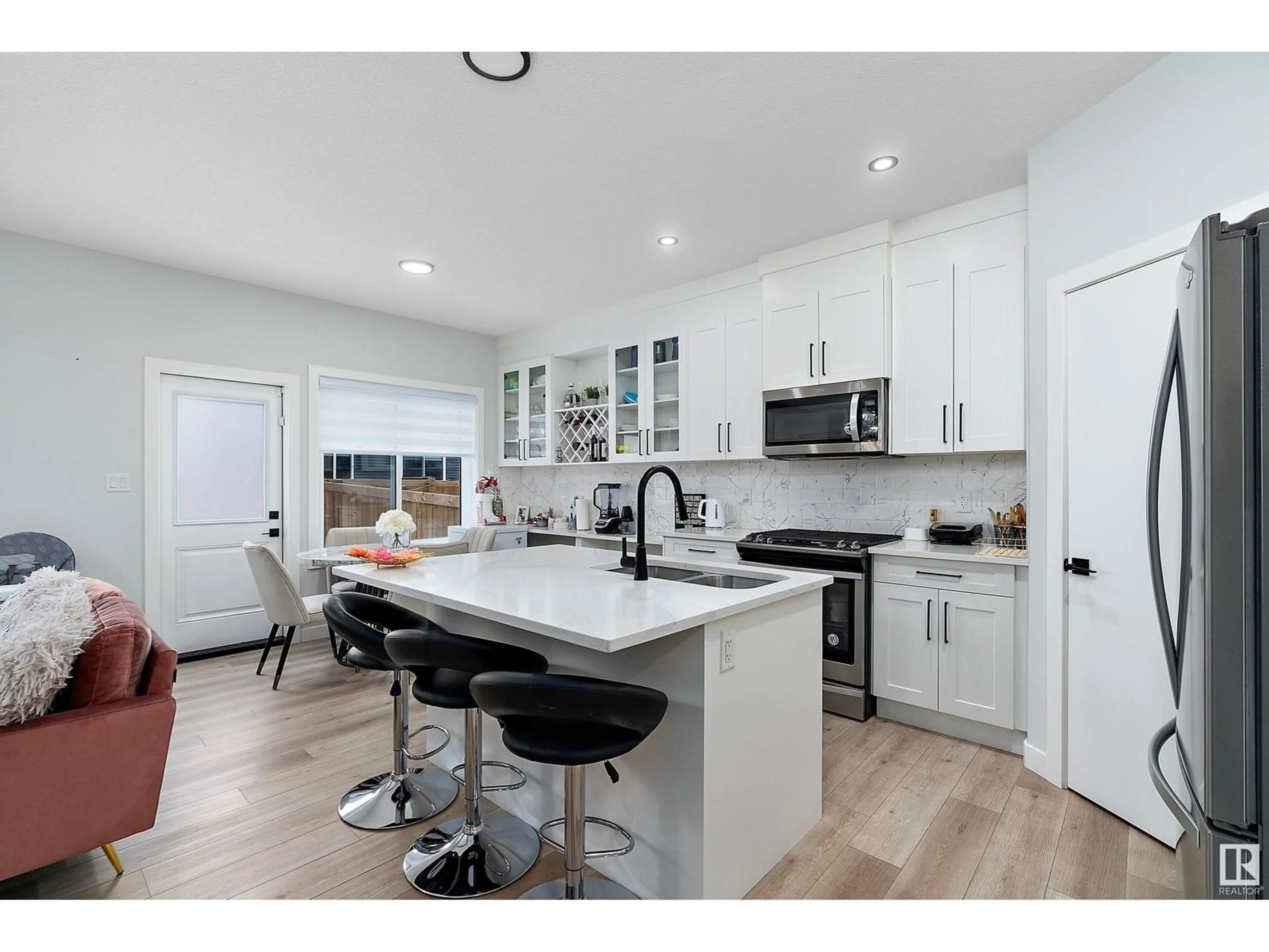 Open concept kitchen, ceramic/tile floor for 19744 28 AV NW, Edmonton Alberta T6M1M1