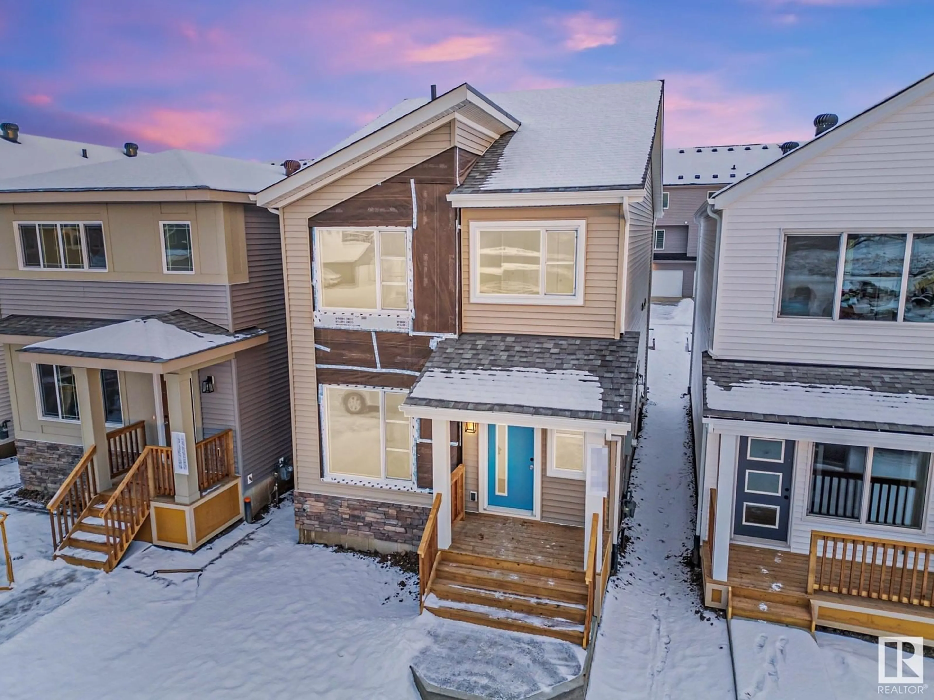 A pic from outside/outdoor area/front of a property/back of a property/a pic from drone, street for 636 174 AV NE, Edmonton Alberta T5Y4E9