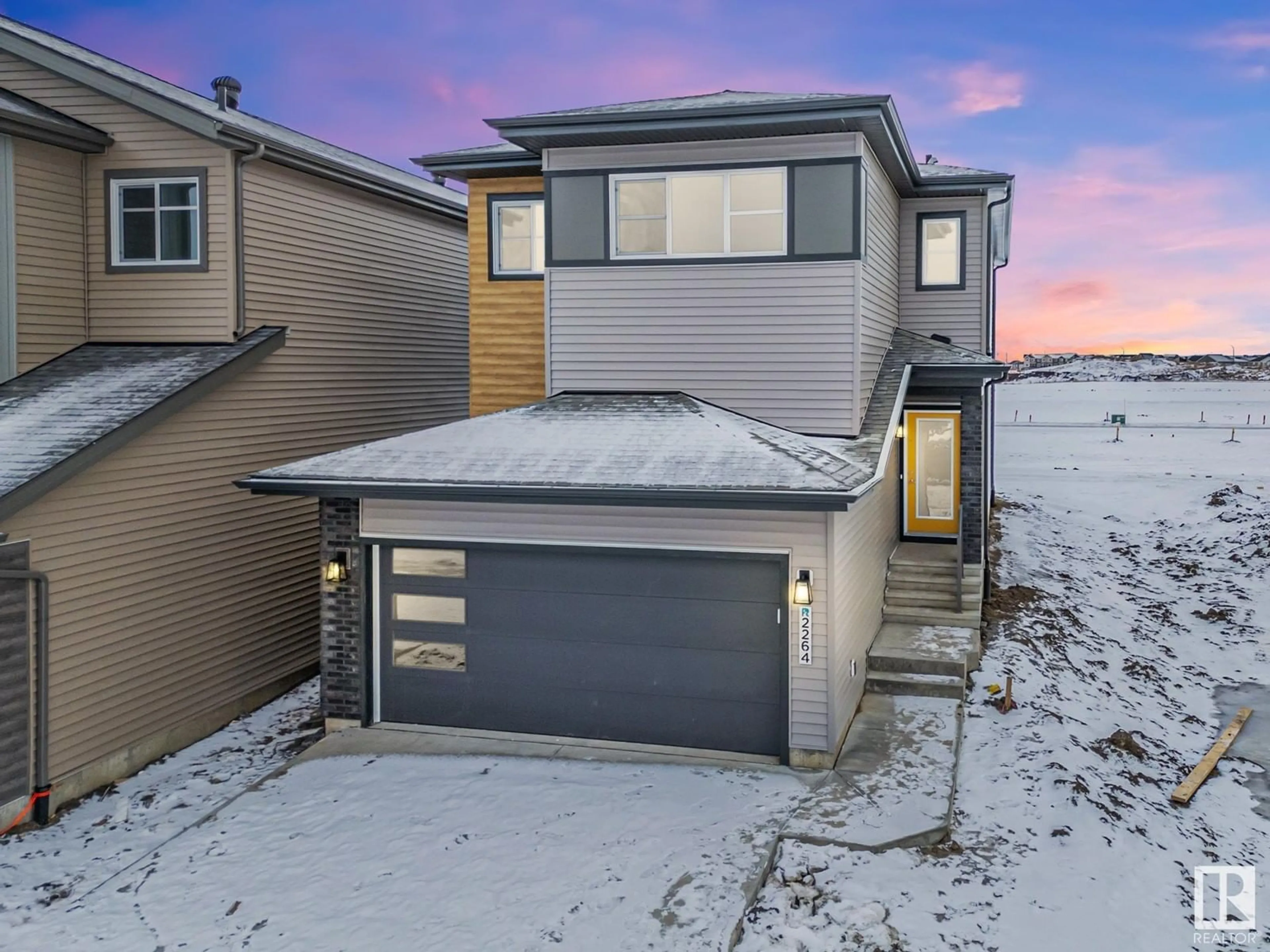 A pic from outside/outdoor area/front of a property/back of a property/a pic from drone, street for 2264 194 ST NW, Edmonton Alberta T6M3B7