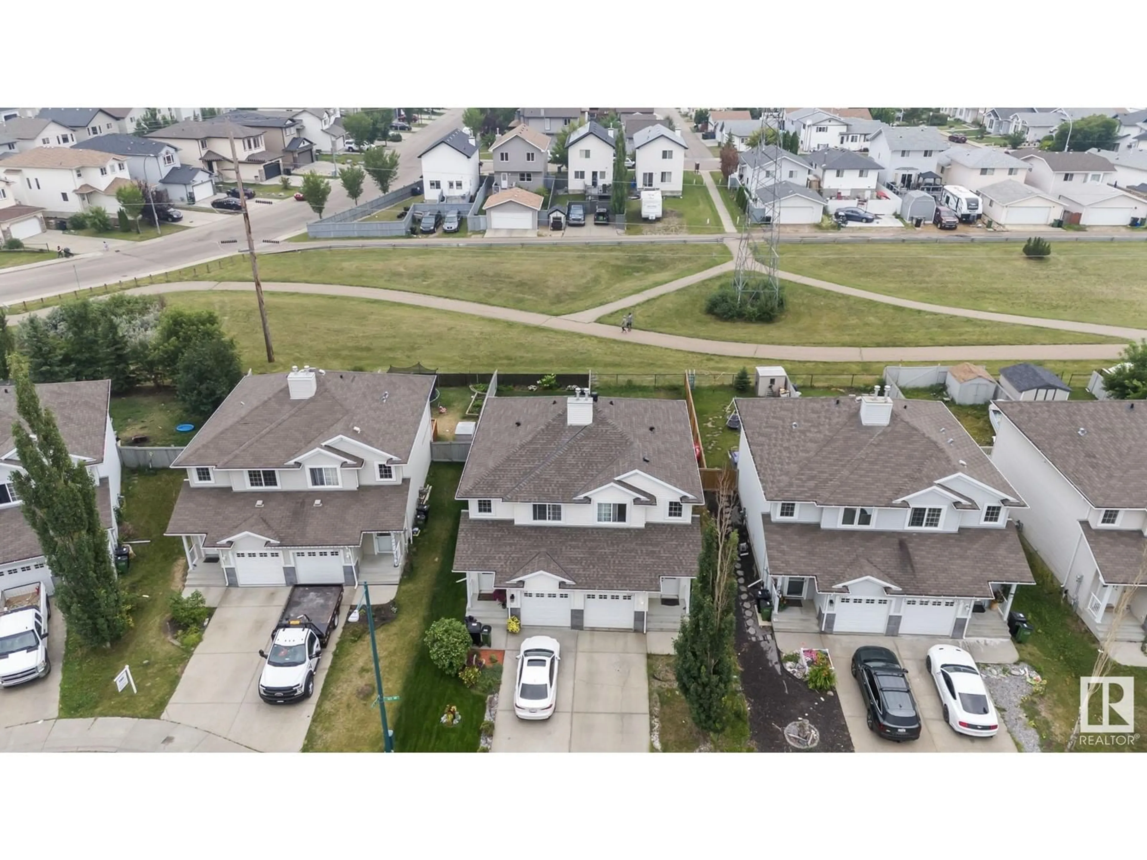 A pic from outside/outdoor area/front of a property/back of a property/a pic from drone, street for 5523 163 AV NW, Edmonton Alberta T5Y3L2