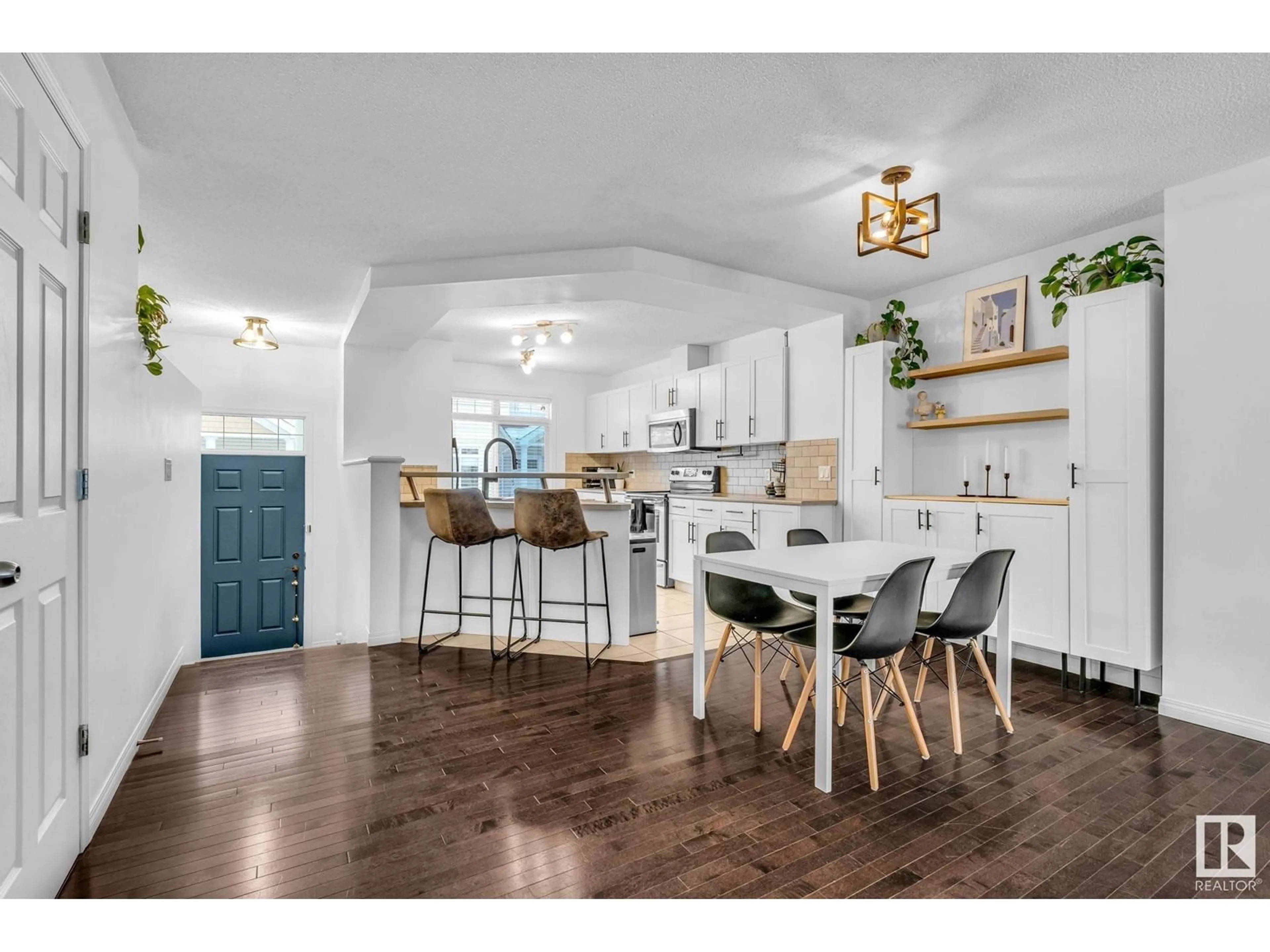 Open concept kitchen, wood/laminate floor for #51 1804 70 ST SW, Edmonton Alberta T6X0H4