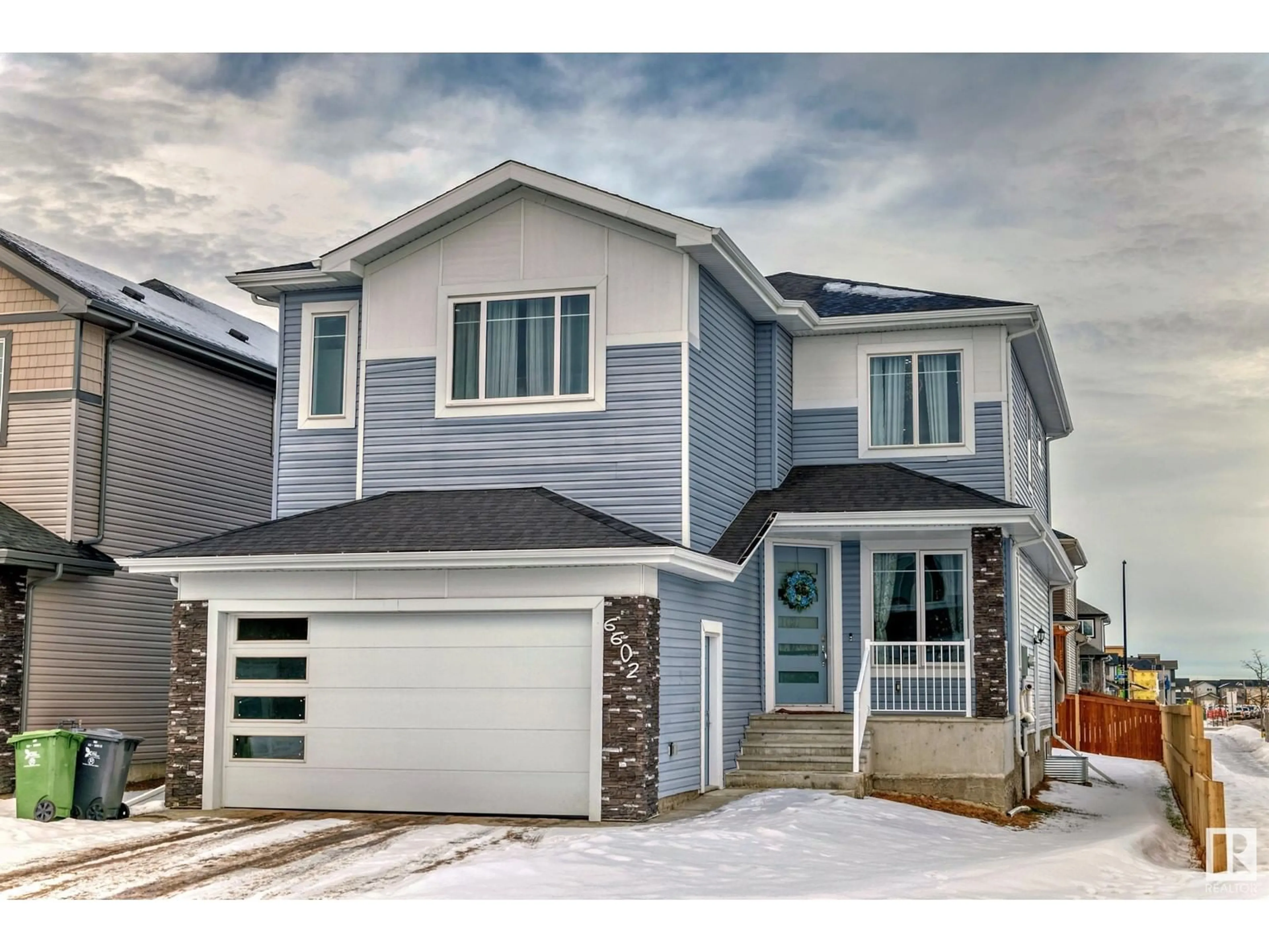 Home with vinyl exterior material, street for 6602 38 AV, Beaumont Alberta T4X0G7