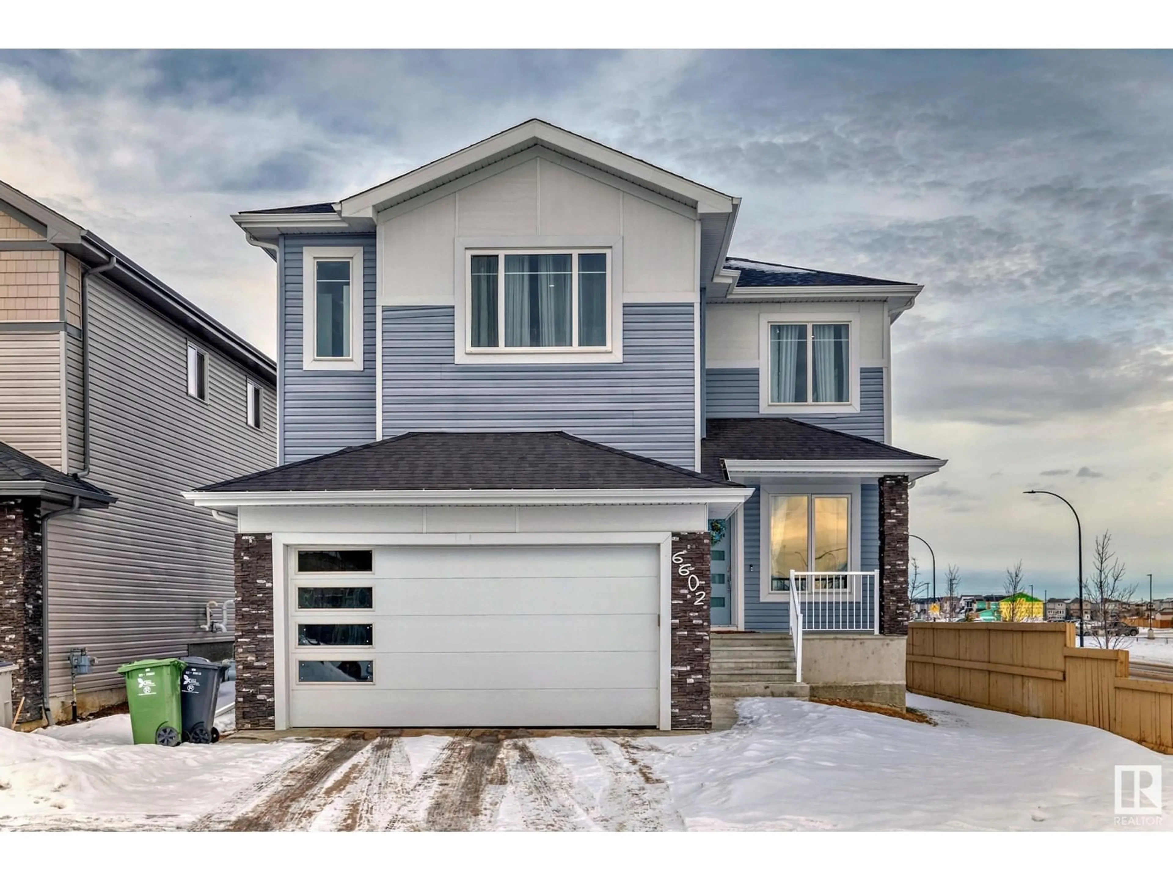 Home with vinyl exterior material, street for 6602 38 AV, Beaumont Alberta T4X0G7