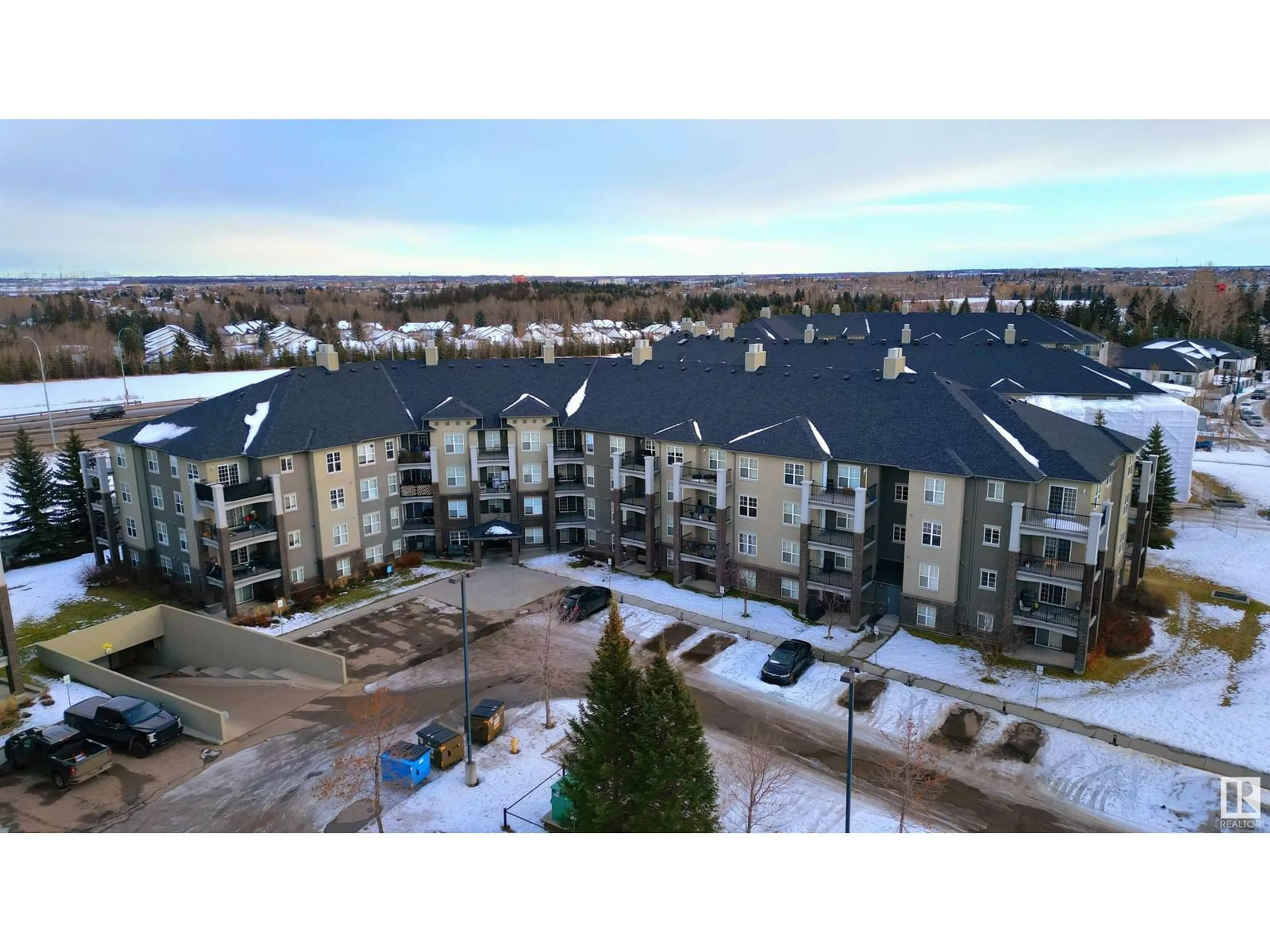 A pic from outside/outdoor area/front of a property/back of a property/a pic from drone, city buildings view from balcony for #407 630 MCALLISTER LO SW, Edmonton Alberta T6W1N3