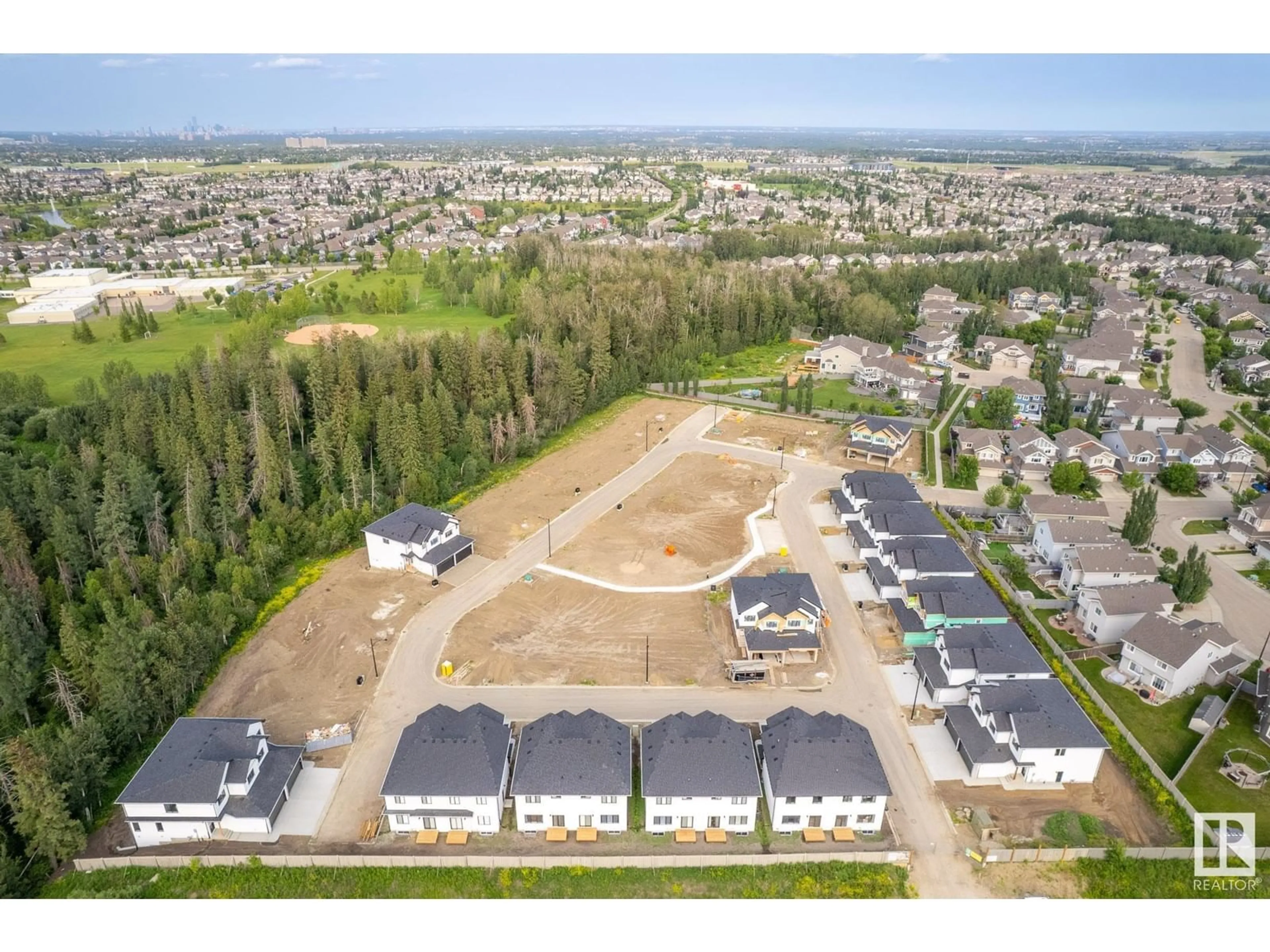 A pic from outside/outdoor area/front of a property/back of a property/a pic from drone, unknown for #55 5122 213A ST NW, Edmonton Alberta T6M0K7