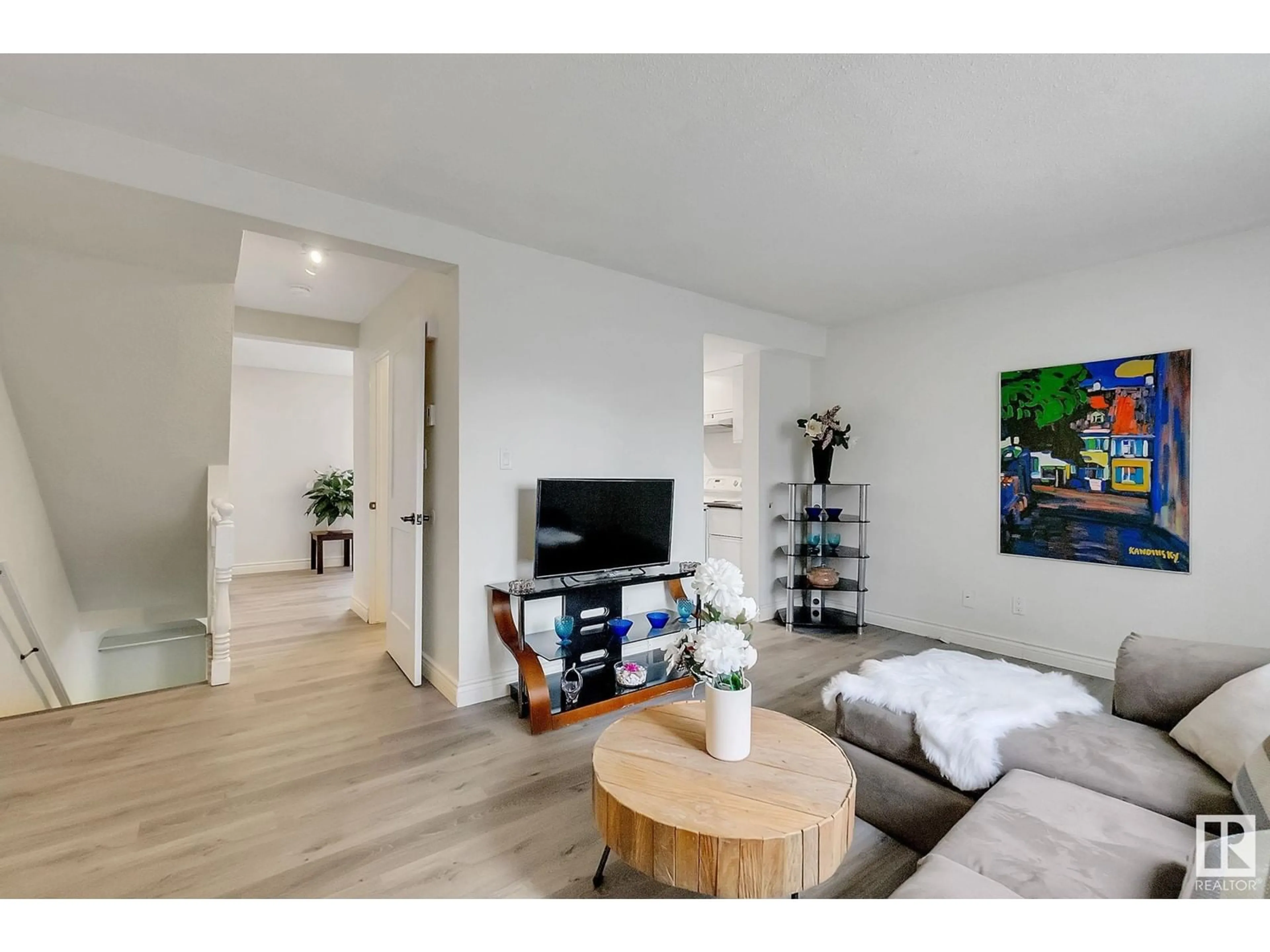 Living room with furniture, wood/laminate floor for 904 ABBOTTSFIELD RD NW, Edmonton Alberta T5W2A1