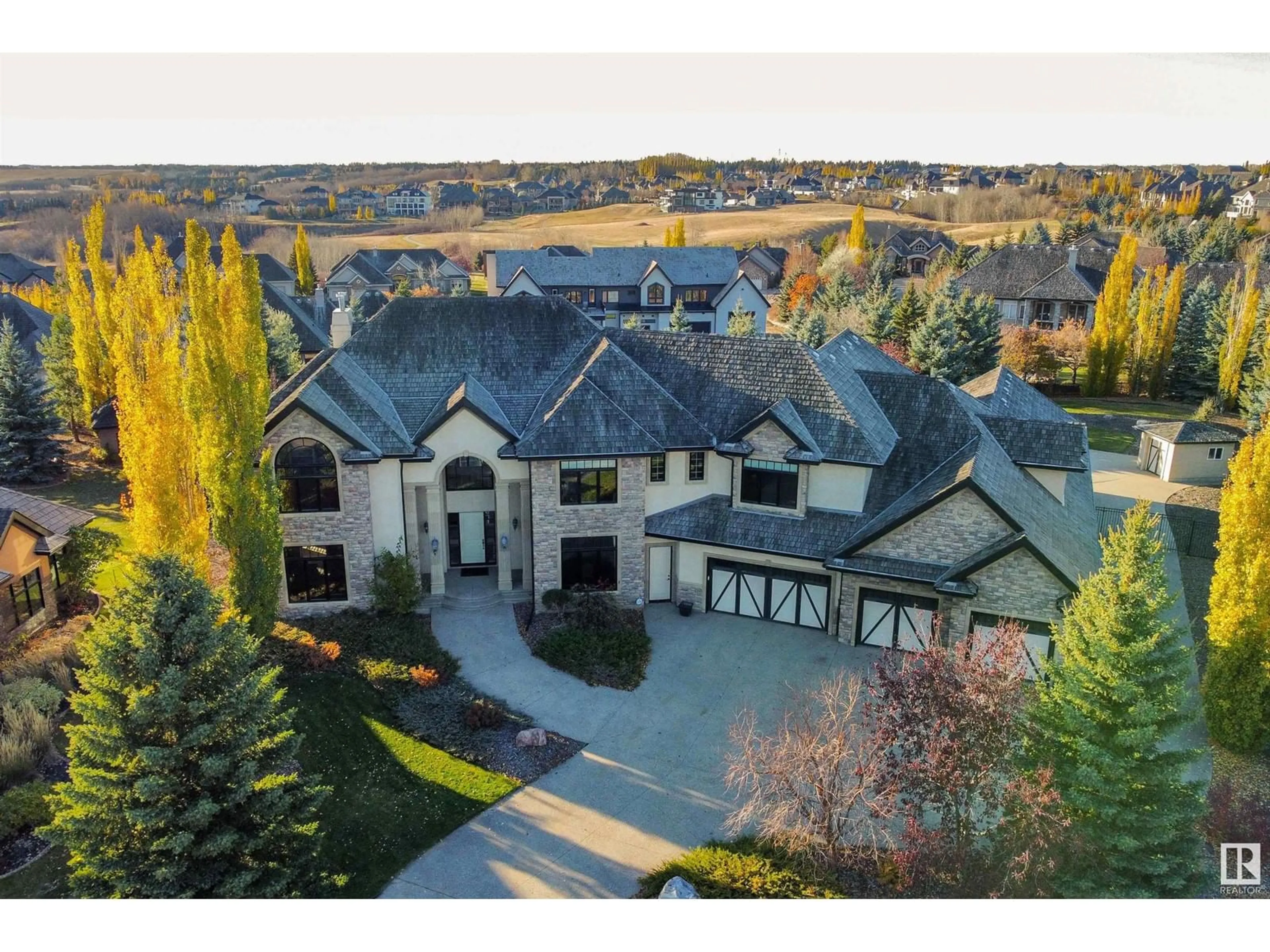 A pic from outside/outdoor area/front of a property/back of a property/a pic from drone, mountain view for 129 RIVERVIEW CR, Rural Sturgeon County Alberta T8T0B9