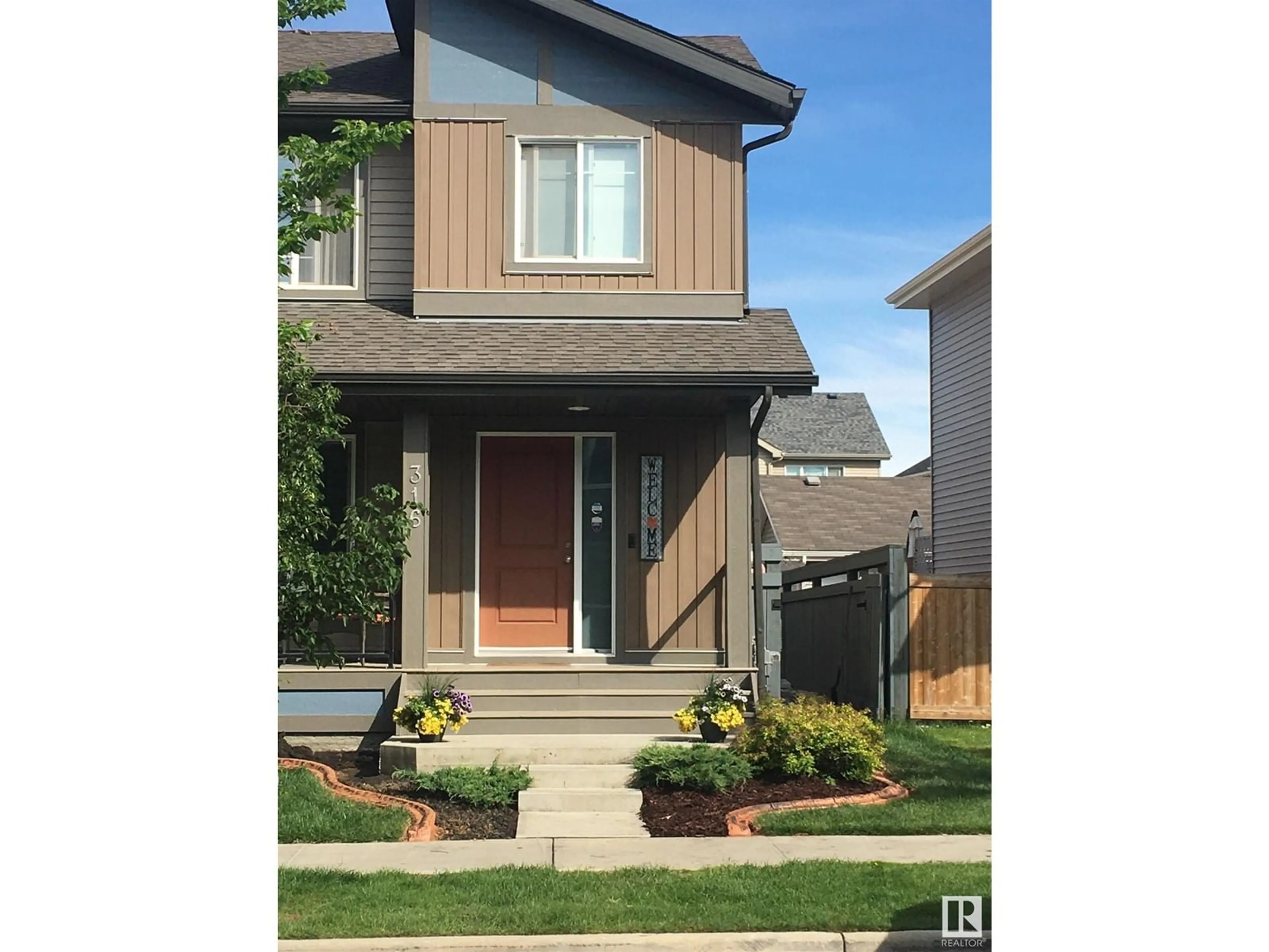 Home with brick exterior material, street for 316 DESROCHERS BV SW SW, Edmonton Alberta T5W3H9