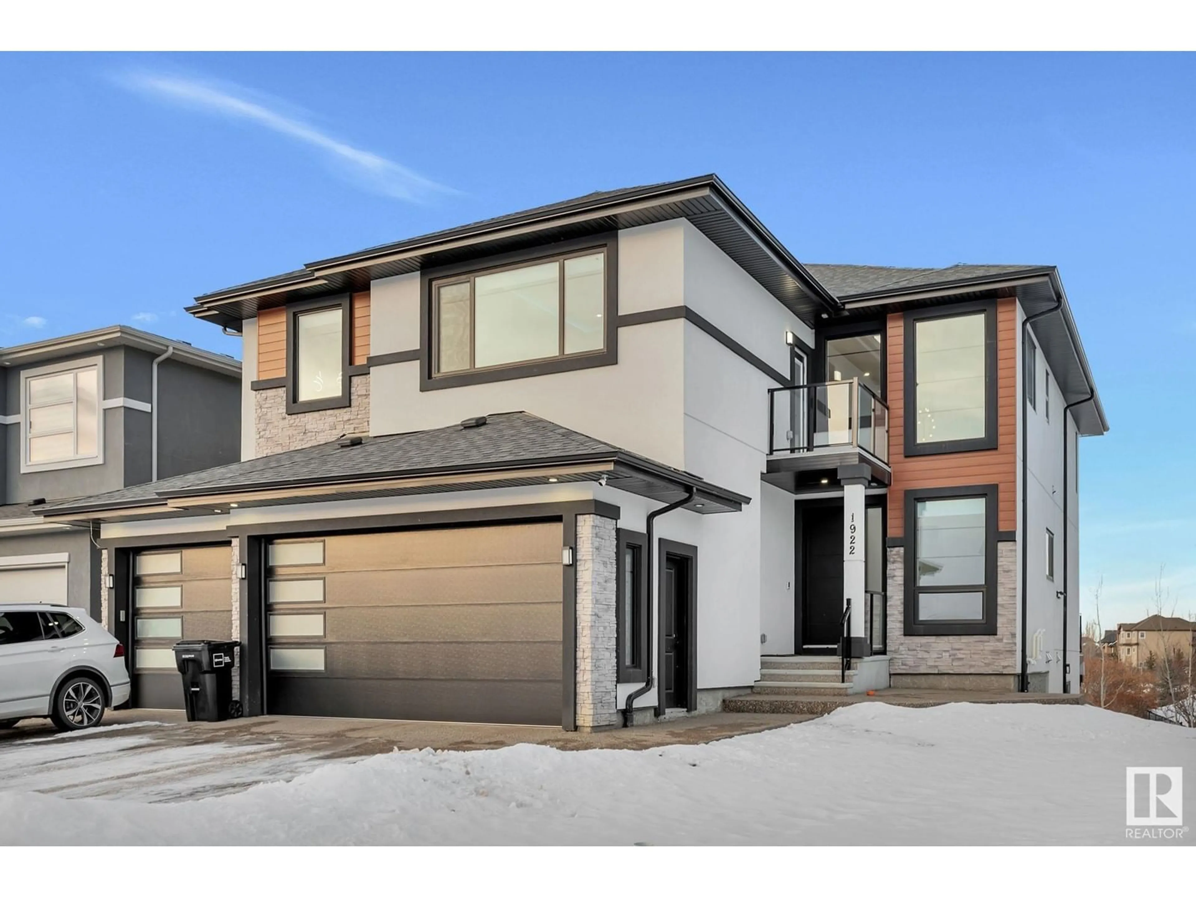 Home with vinyl exterior material, street for 1922 ADAMSON TC SW, Edmonton Alberta T6W2N7