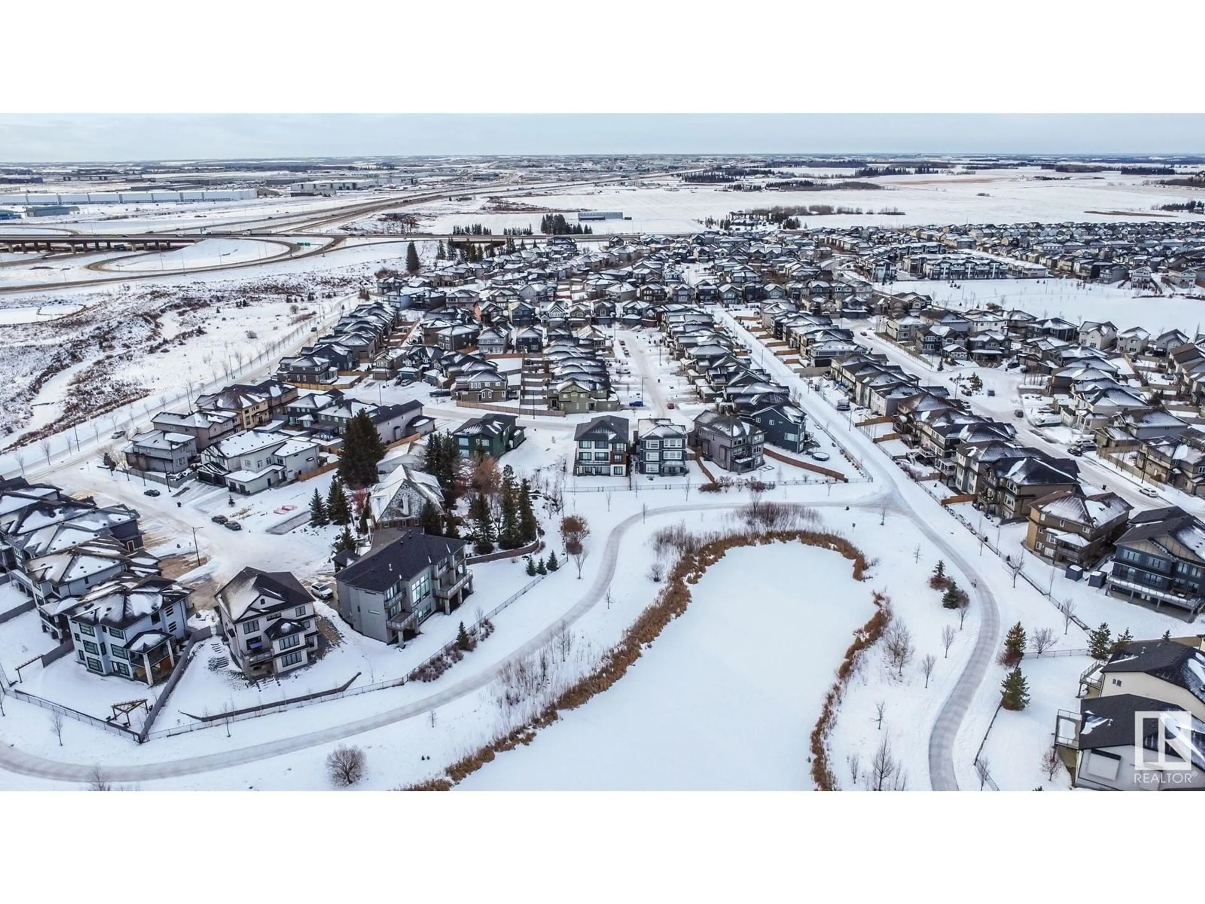 A pic from outside/outdoor area/front of a property/back of a property/a pic from drone, street for 1922 ADAMSON TC SW, Edmonton Alberta T6W2N7