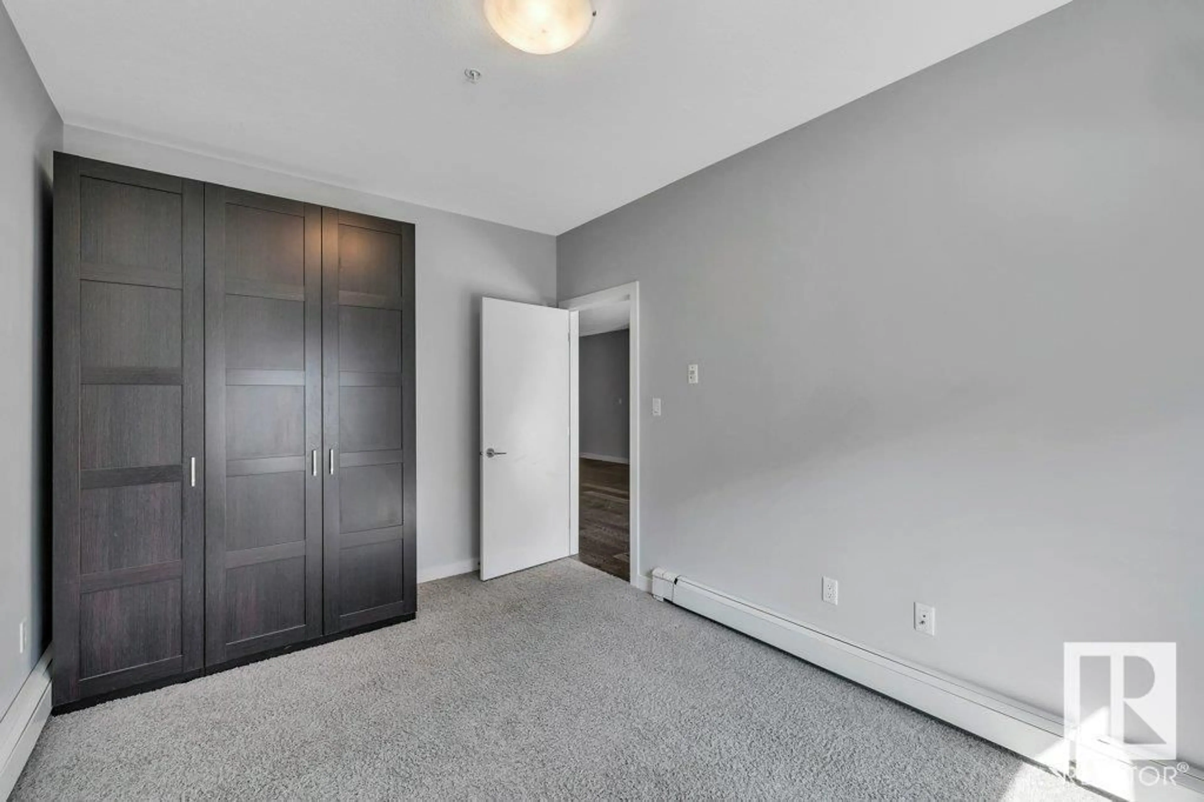 A pic of a room for #106 - 10611 117 ST, Edmonton Alberta T5H0G6