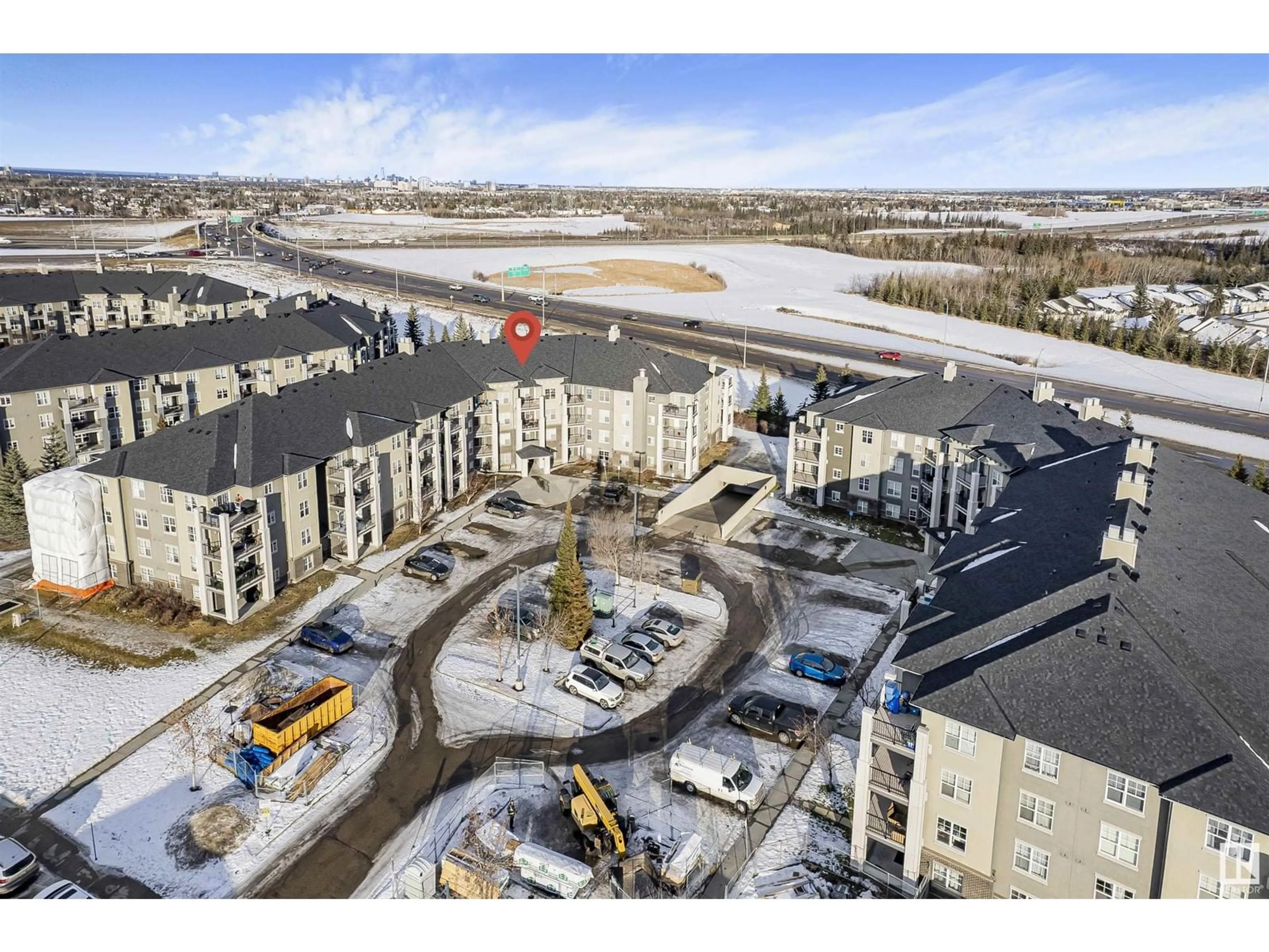 A pic from outside/outdoor area/front of a property/back of a property/a pic from drone, unknown for #210 622 MCALLISTER LO SW, Edmonton Alberta T6W1N2