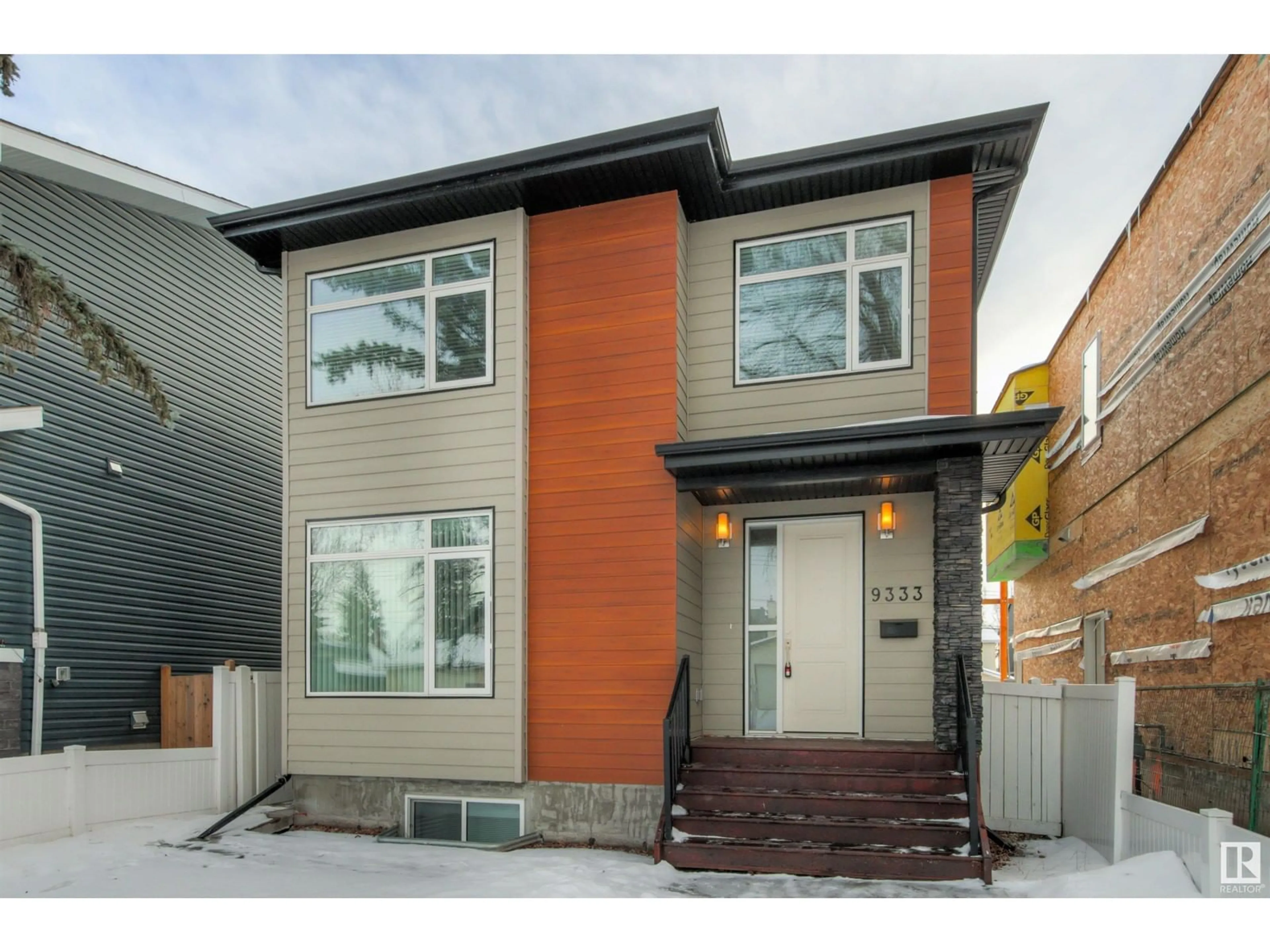 Home with vinyl exterior material, street for 9333 87 AV NW, Edmonton Alberta T6C1K3