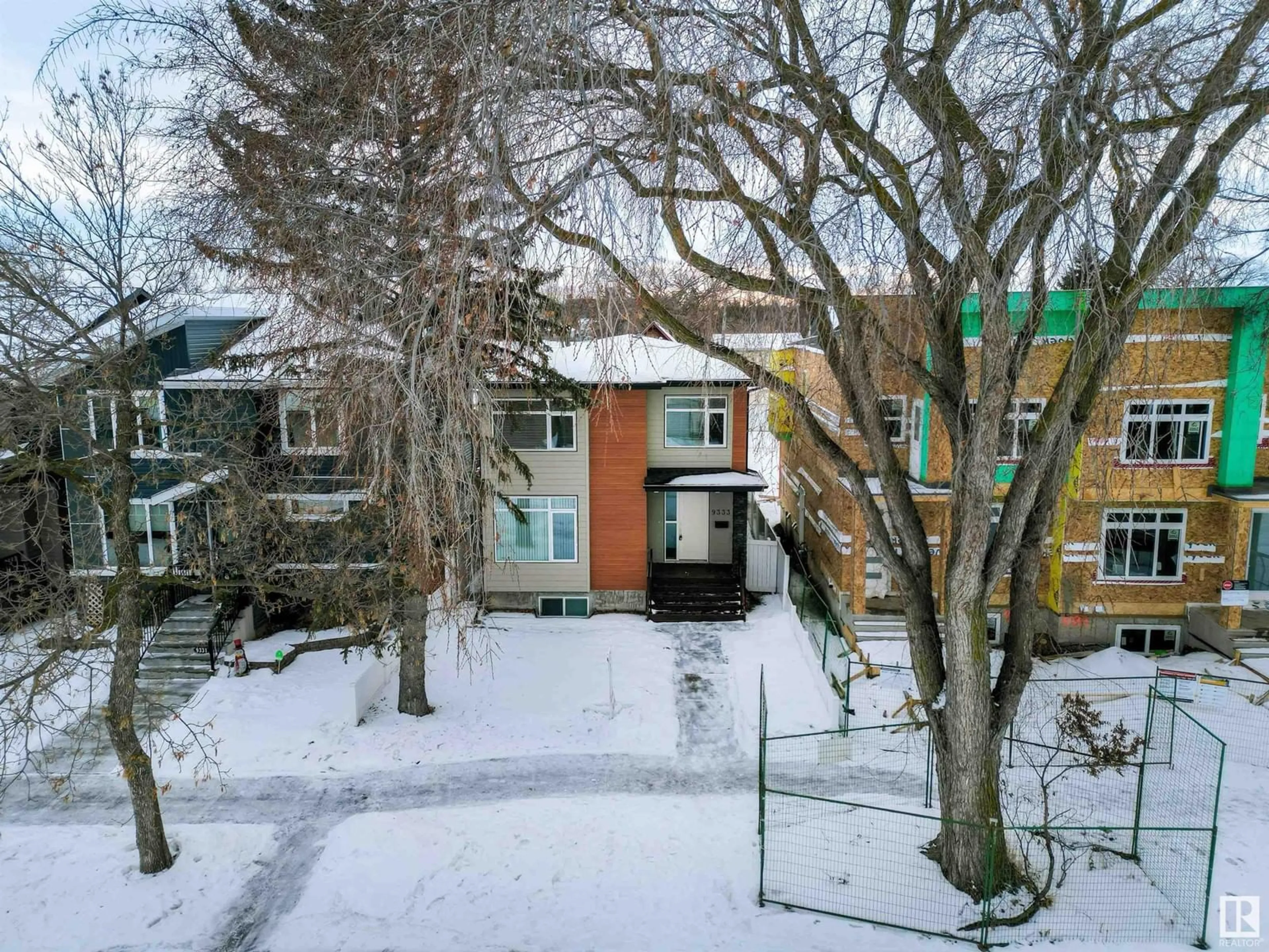 A pic from outside/outdoor area/front of a property/back of a property/a pic from drone, street for 9333 87 AV NW, Edmonton Alberta T6C1K3