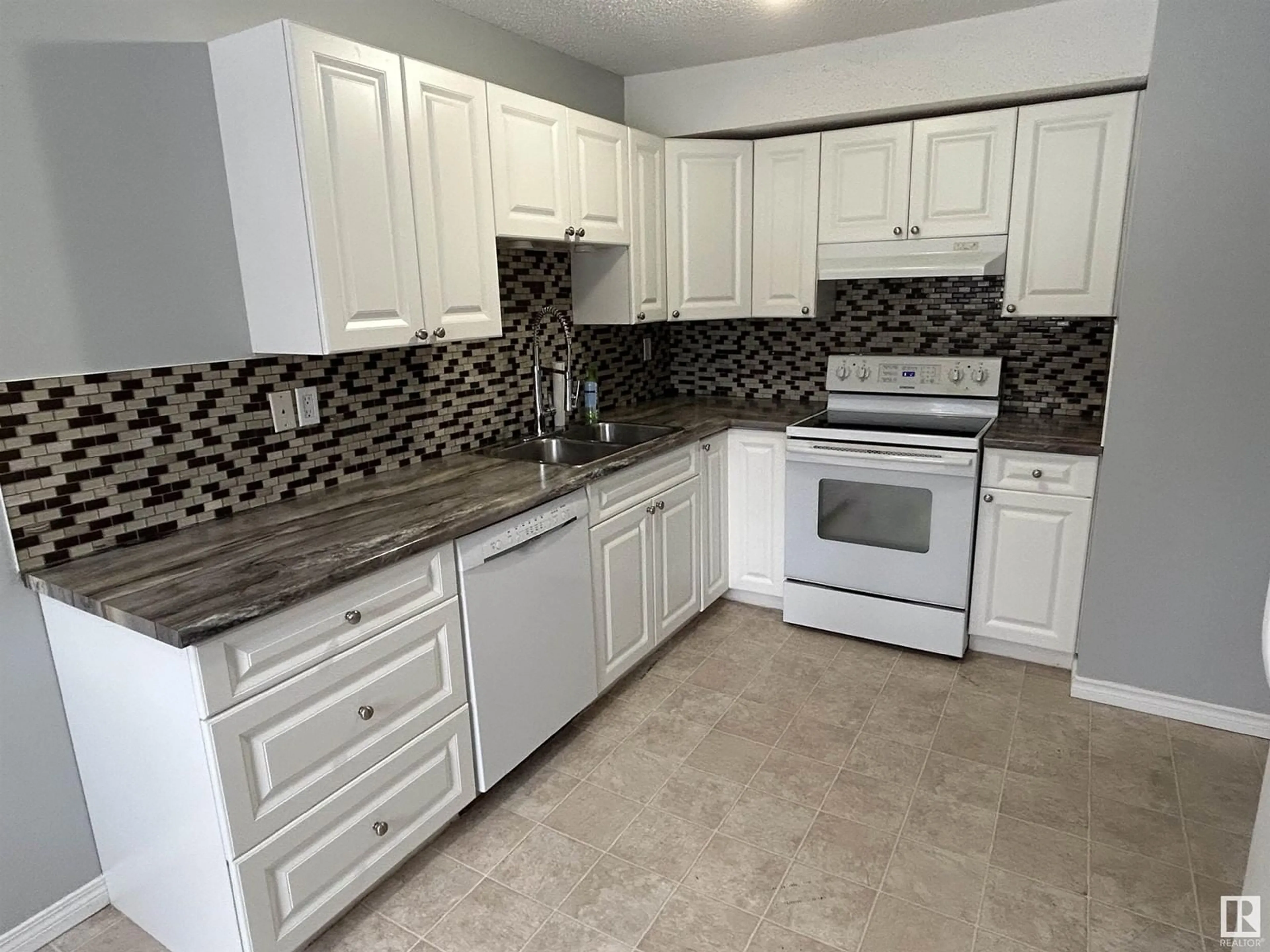 Standard kitchen, ceramic/tile floor for 1277 Hooke RD NW NW, Edmonton Alberta T5A4A5