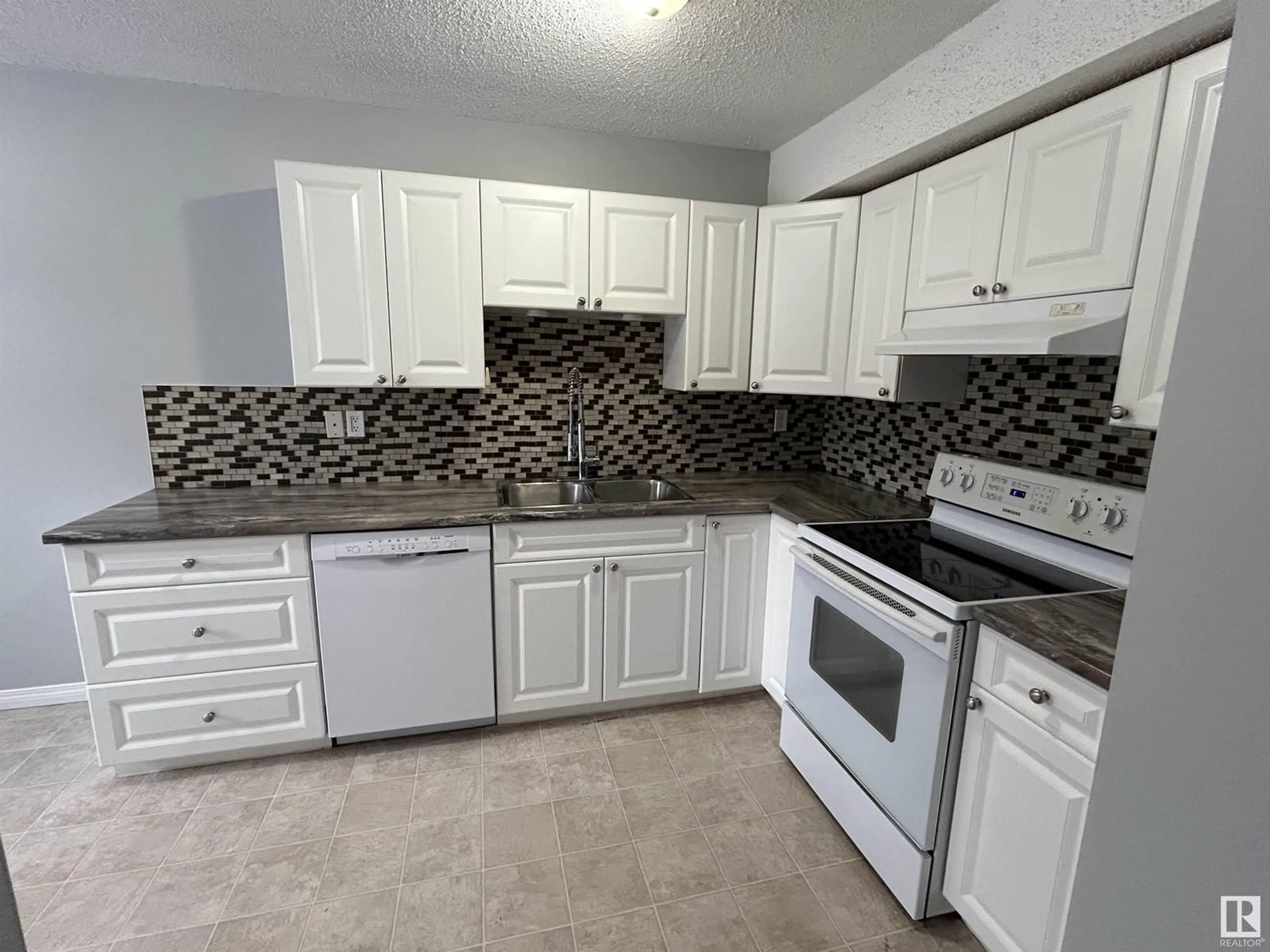 Standard kitchen, ceramic/tile floor for 1277 Hooke RD NW NW, Edmonton Alberta T5A4A5