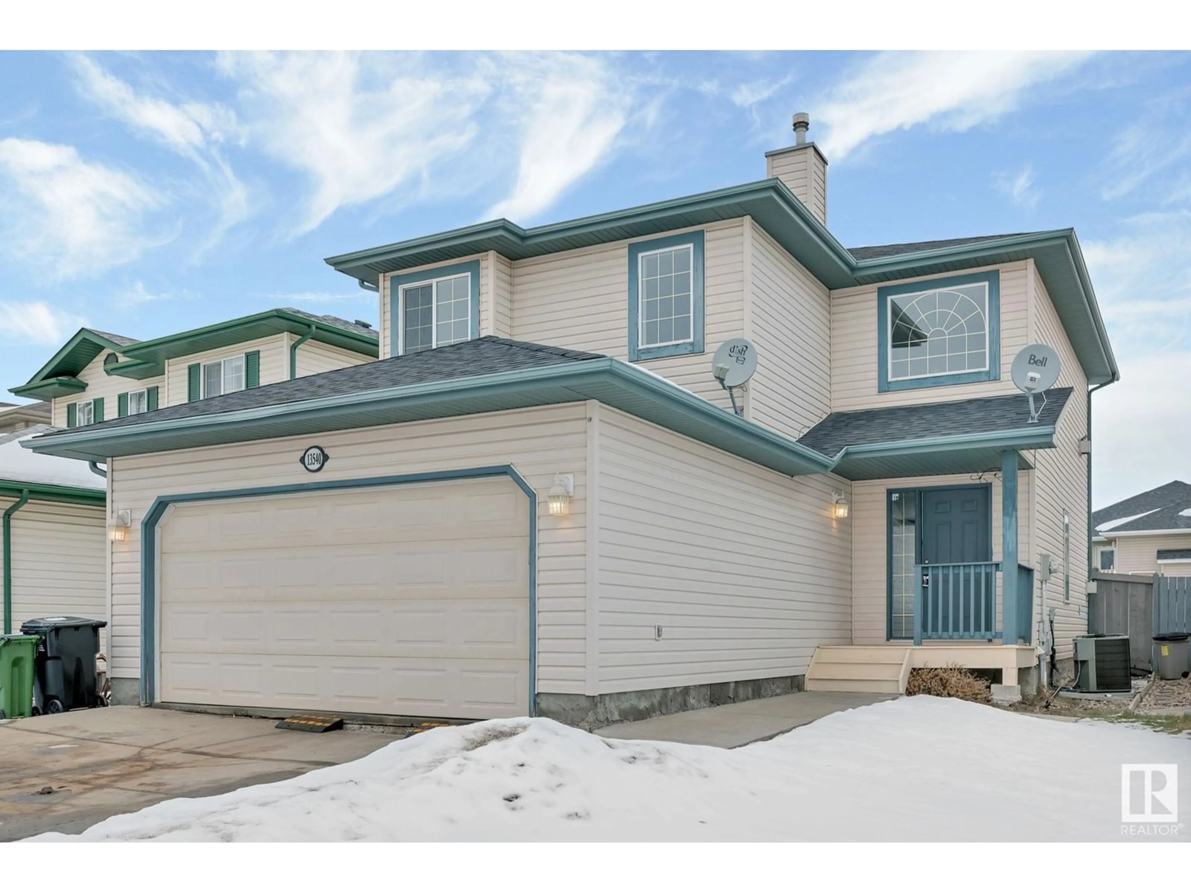 Home with vinyl exterior material, street for 13540 149 AV NW, Edmonton Alberta T6V1M1