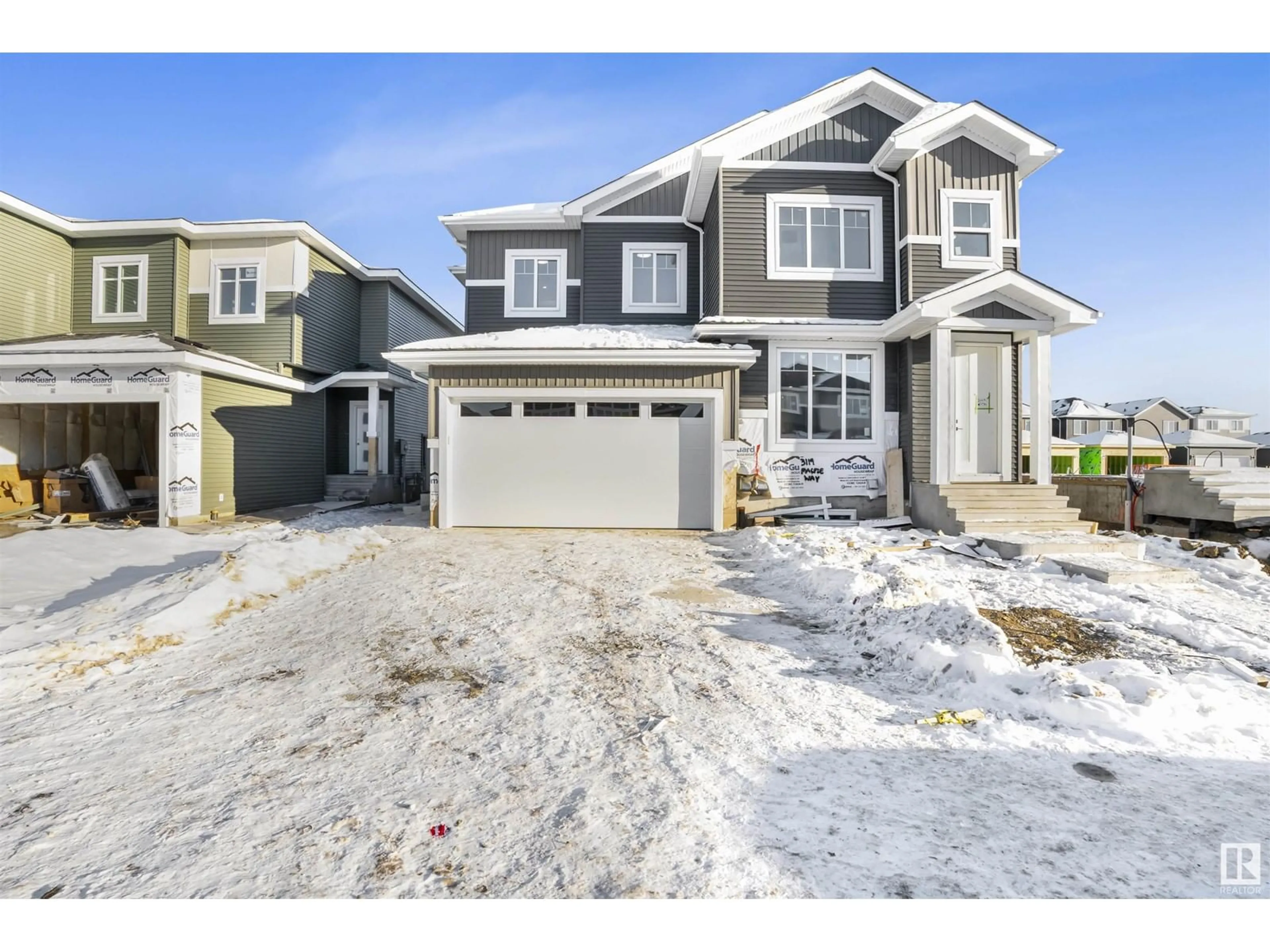 Home with vinyl exterior material, street for 3117 Magpie WY NW, Edmonton Alberta T5S0A0