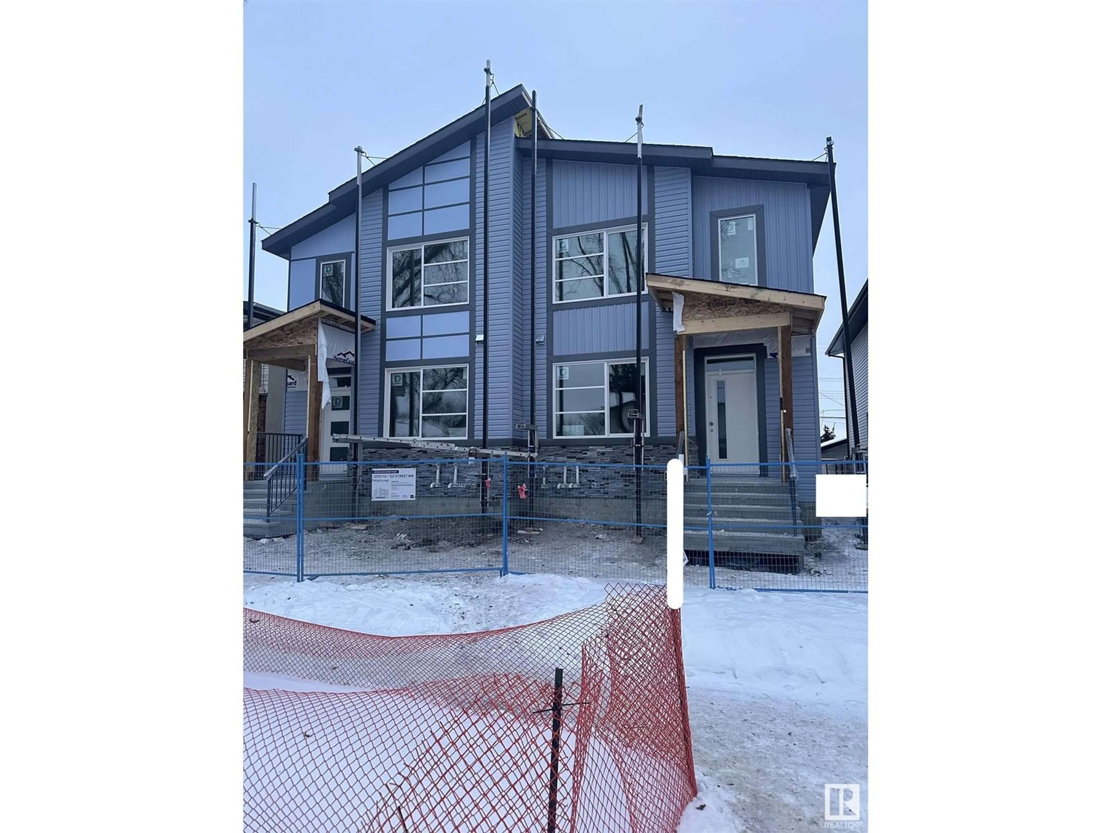 Home with vinyl exterior material, building for 12113 122 ST NW, Edmonton Alberta T5L0C9