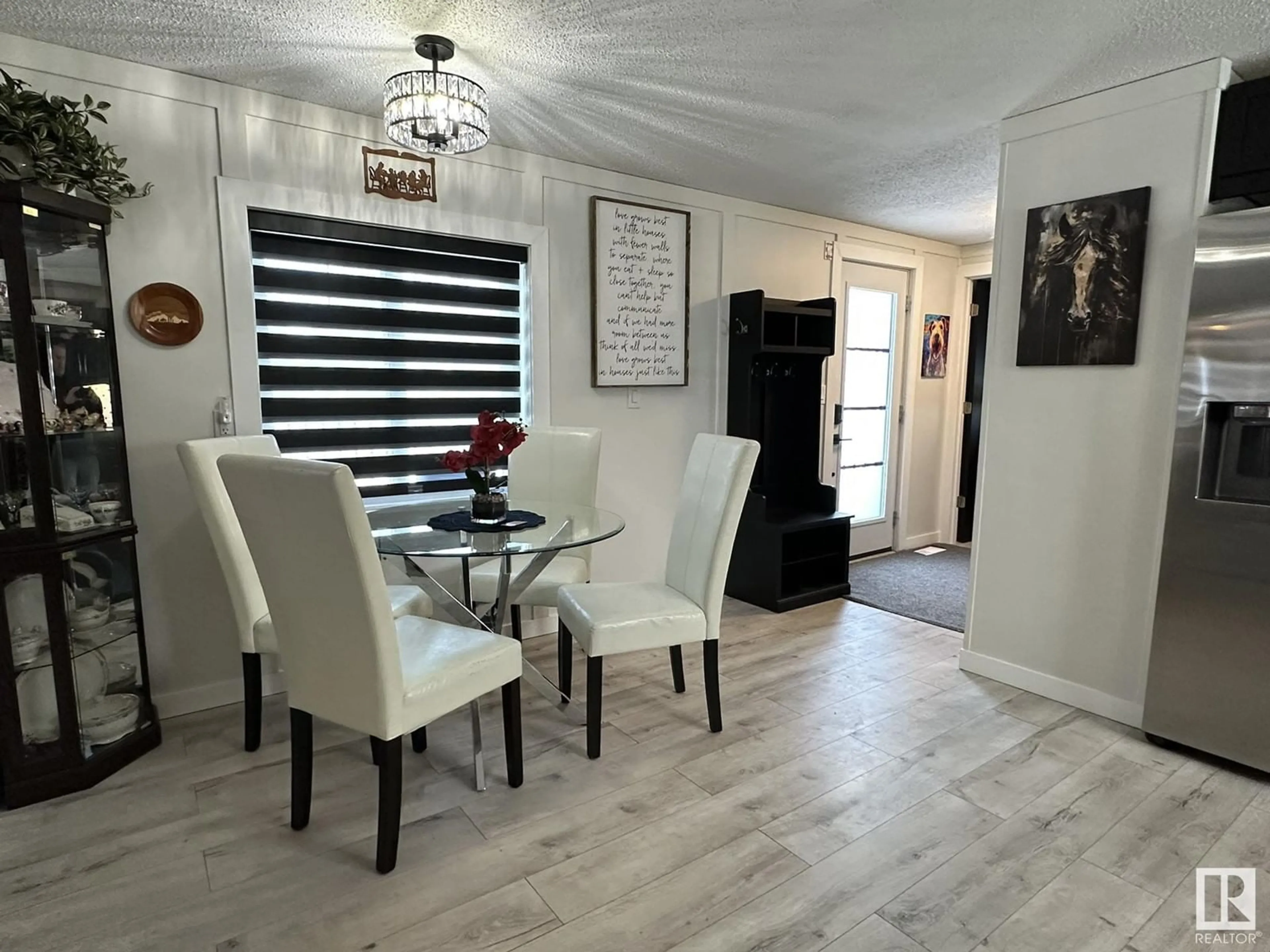 Dining room, wood/laminate floor for 4435 MARIA CL, Smoky Lake Town Alberta T0A3C0