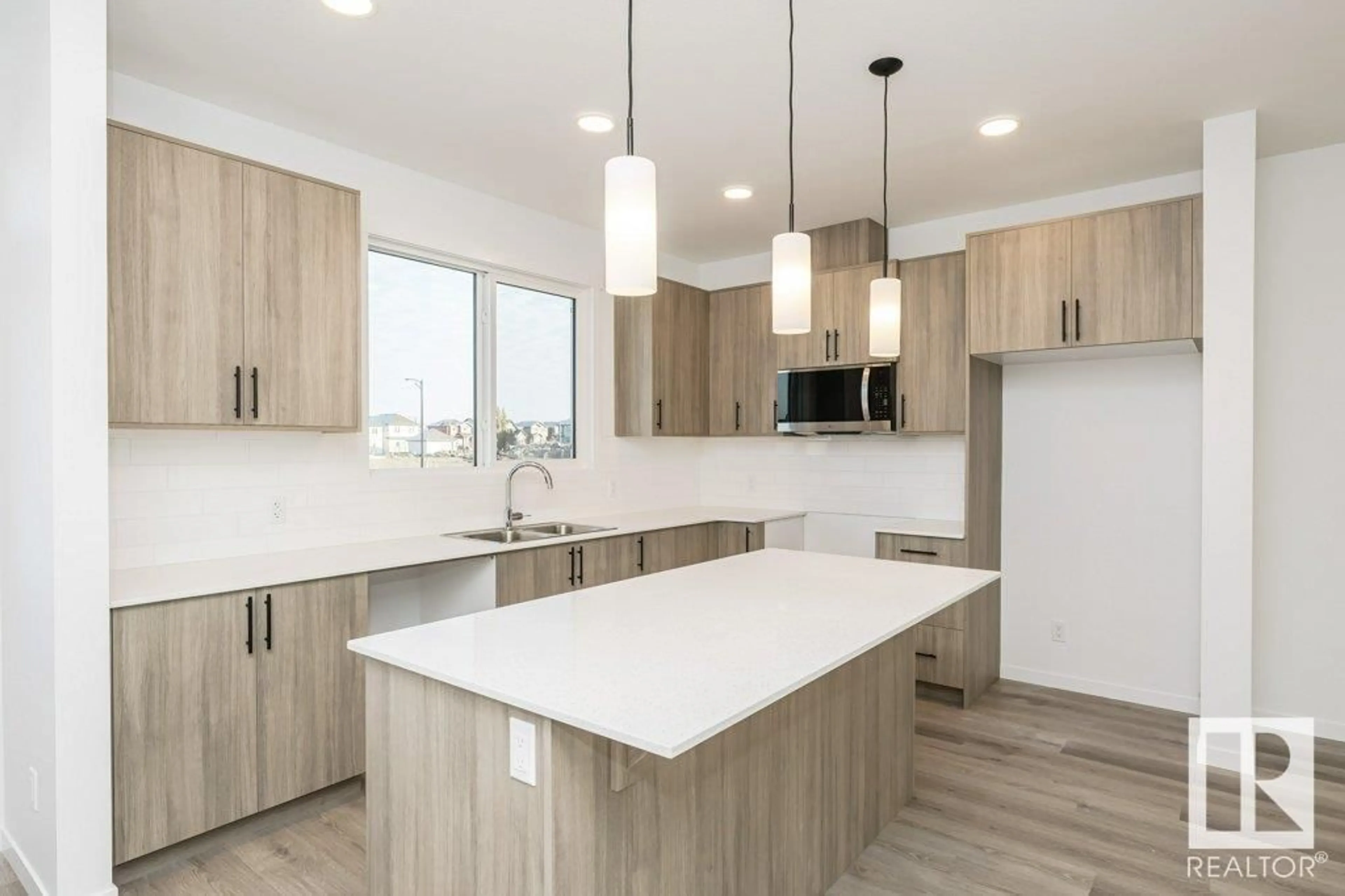 Open concept kitchen, unknown for 6244 175 AV NW, Edmonton Alberta T5Y4H3