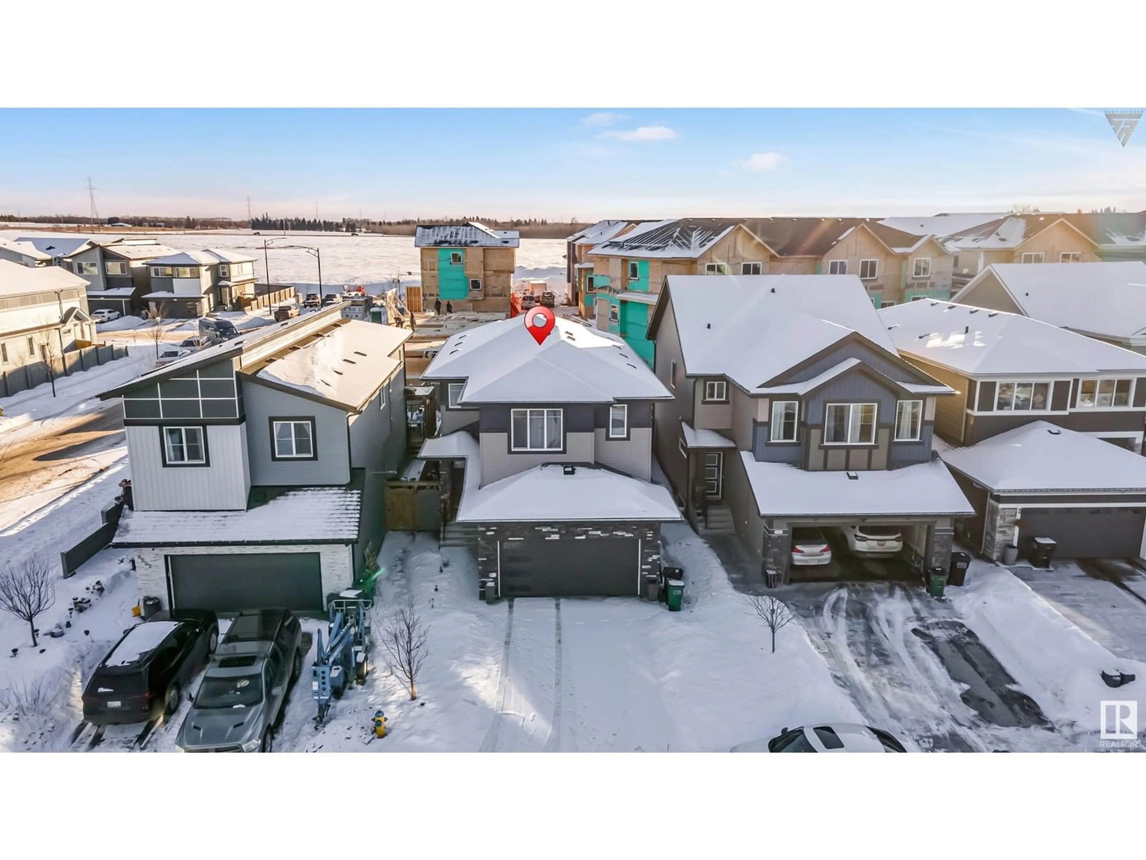 A pic from outside/outdoor area/front of a property/back of a property/a pic from drone, mountain view for 9505 PEAR CL SW, Edmonton Alberta T6X2N6