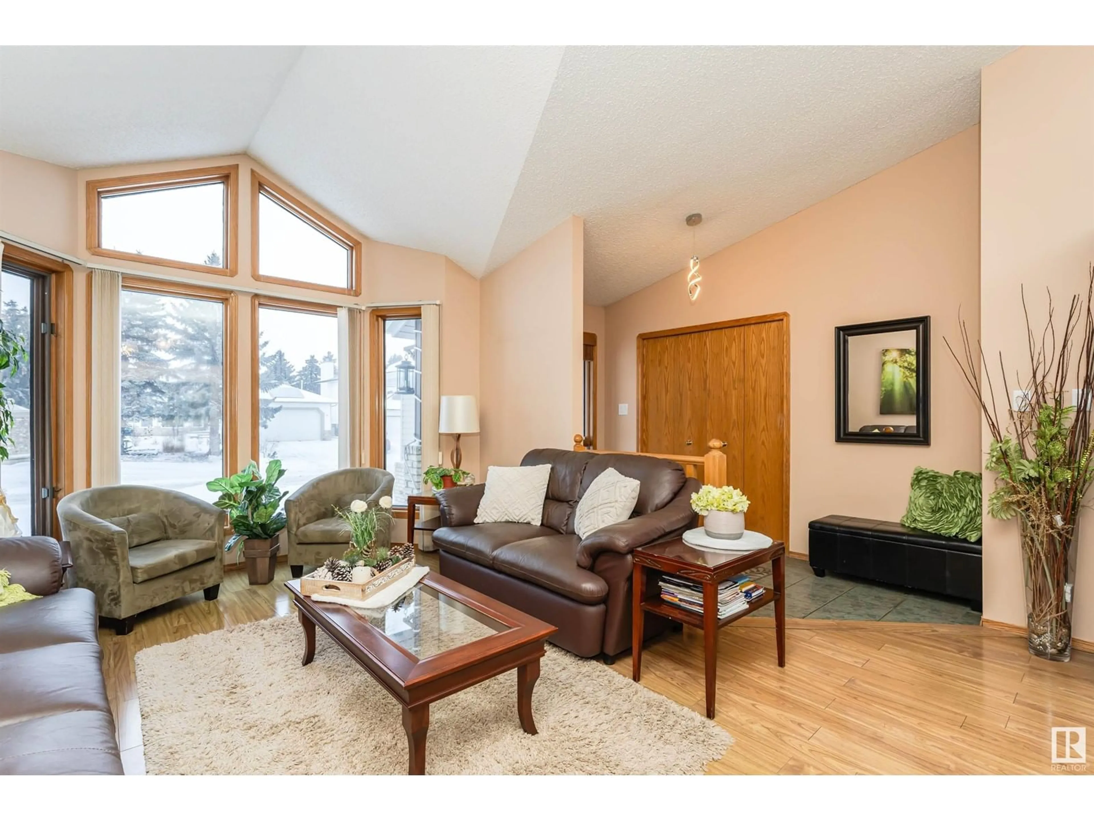 Living room with furniture, wood/laminate floor for 3 FAIRWAY DR, Spruce Grove Alberta T7X3C9