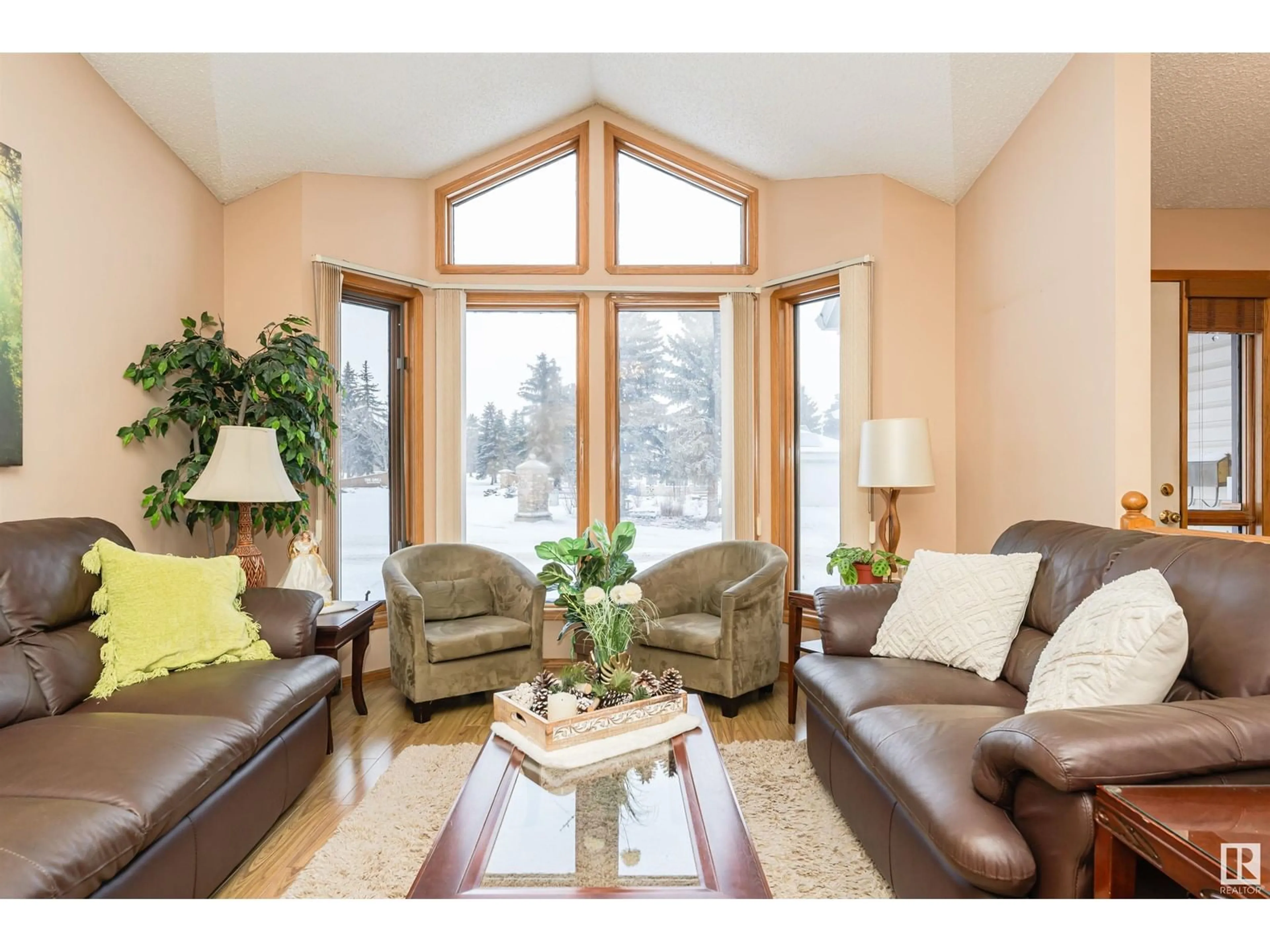 Living room with furniture, wood/laminate floor for 3 FAIRWAY DR, Spruce Grove Alberta T7X3C9