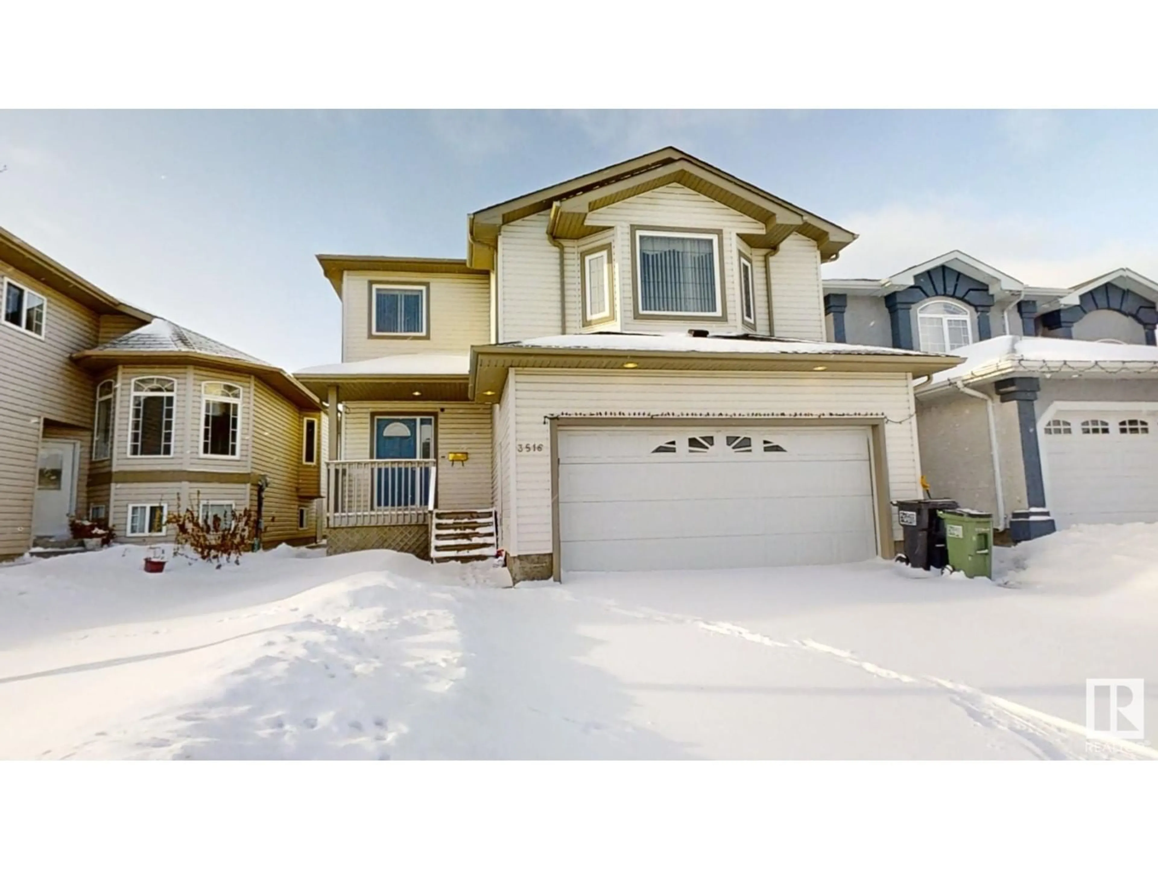 Home with vinyl exterior material, street for 3516 29 ST NW, Edmonton Alberta T6T1R3