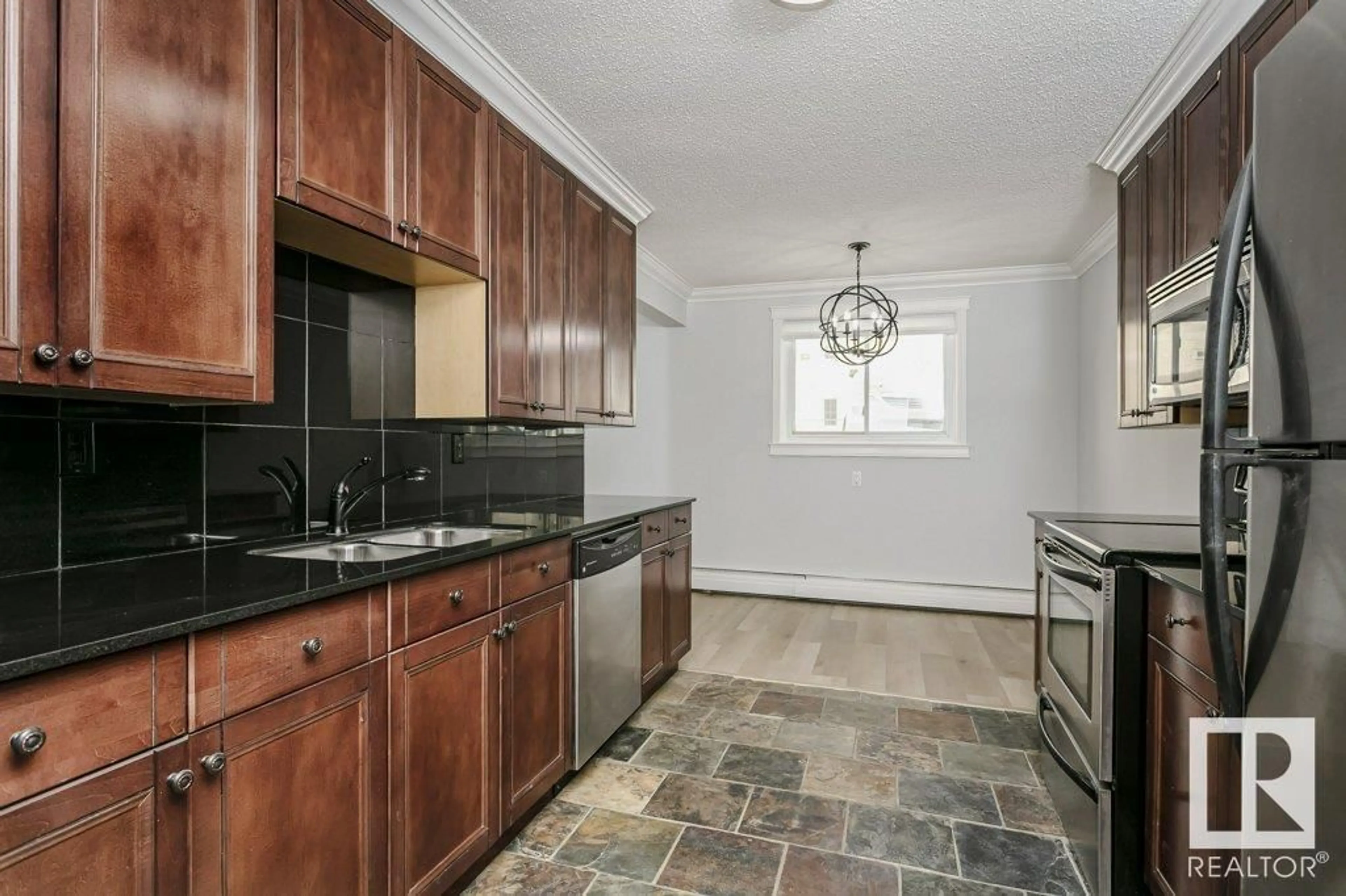 Standard kitchen, ceramic/tile floor for #107 10745 83 AV NW, Edmonton Alberta T6E2E5