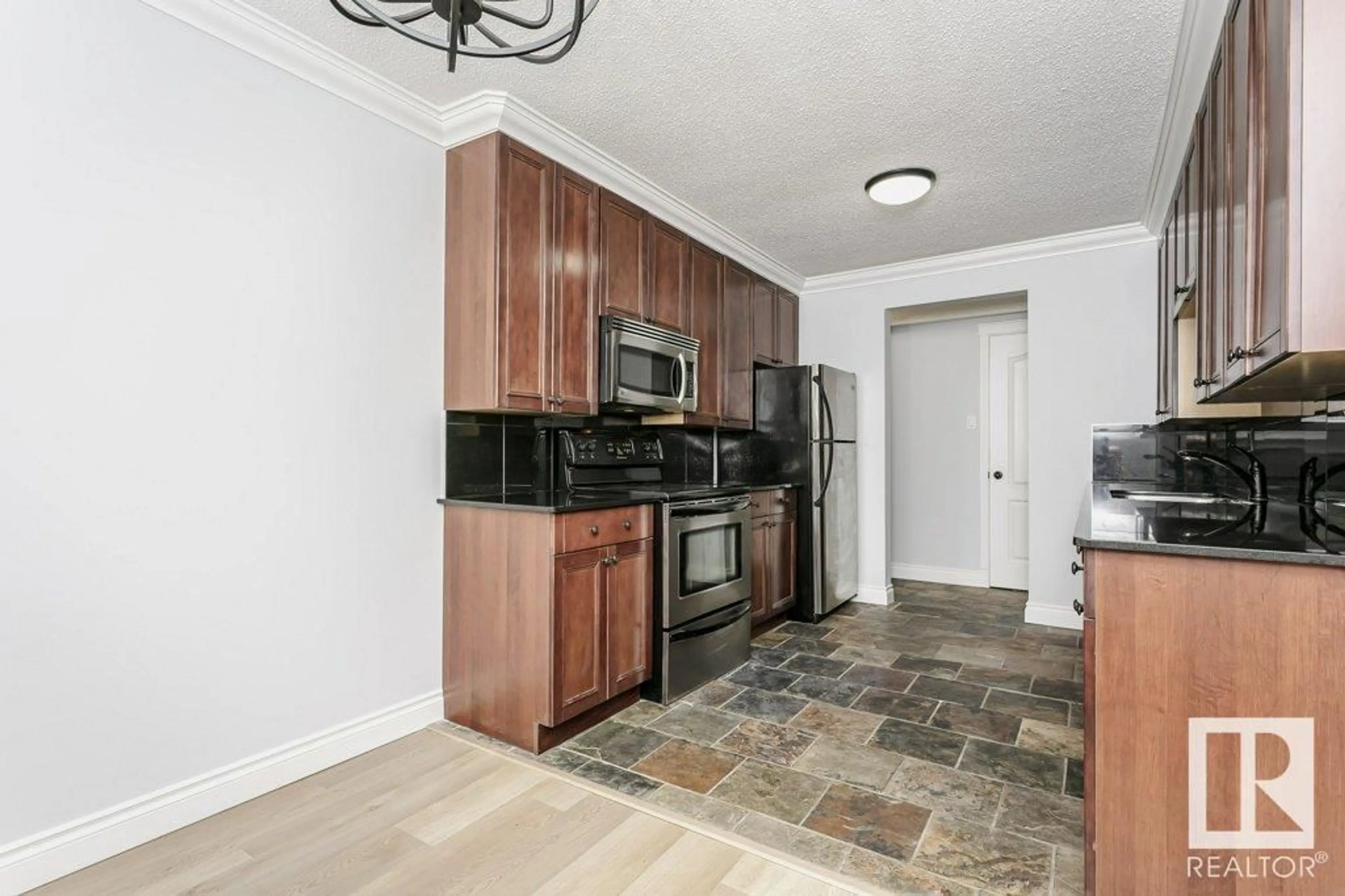 Standard kitchen, ceramic/tile floor for #107 10745 83 AV NW, Edmonton Alberta T6E2E5