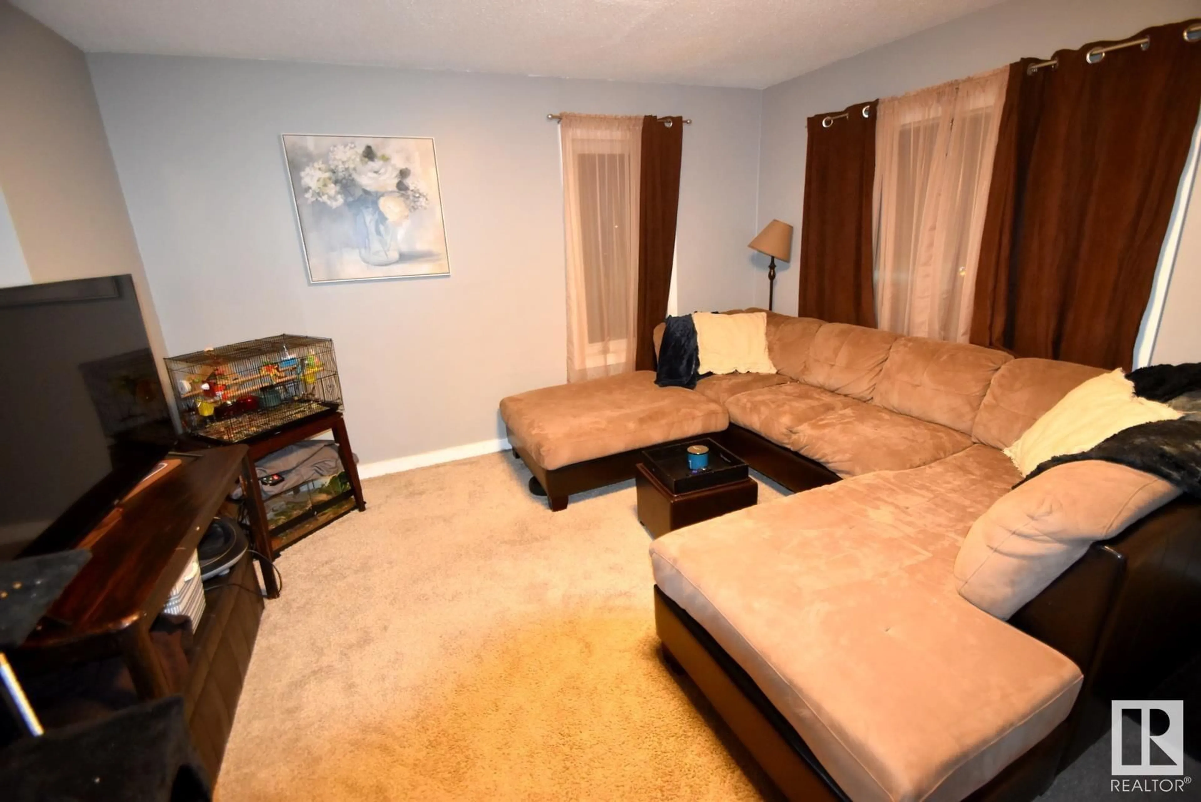 Living room with furniture, unknown for 11544 88 ST NW NW, Edmonton Alberta T5R3B3