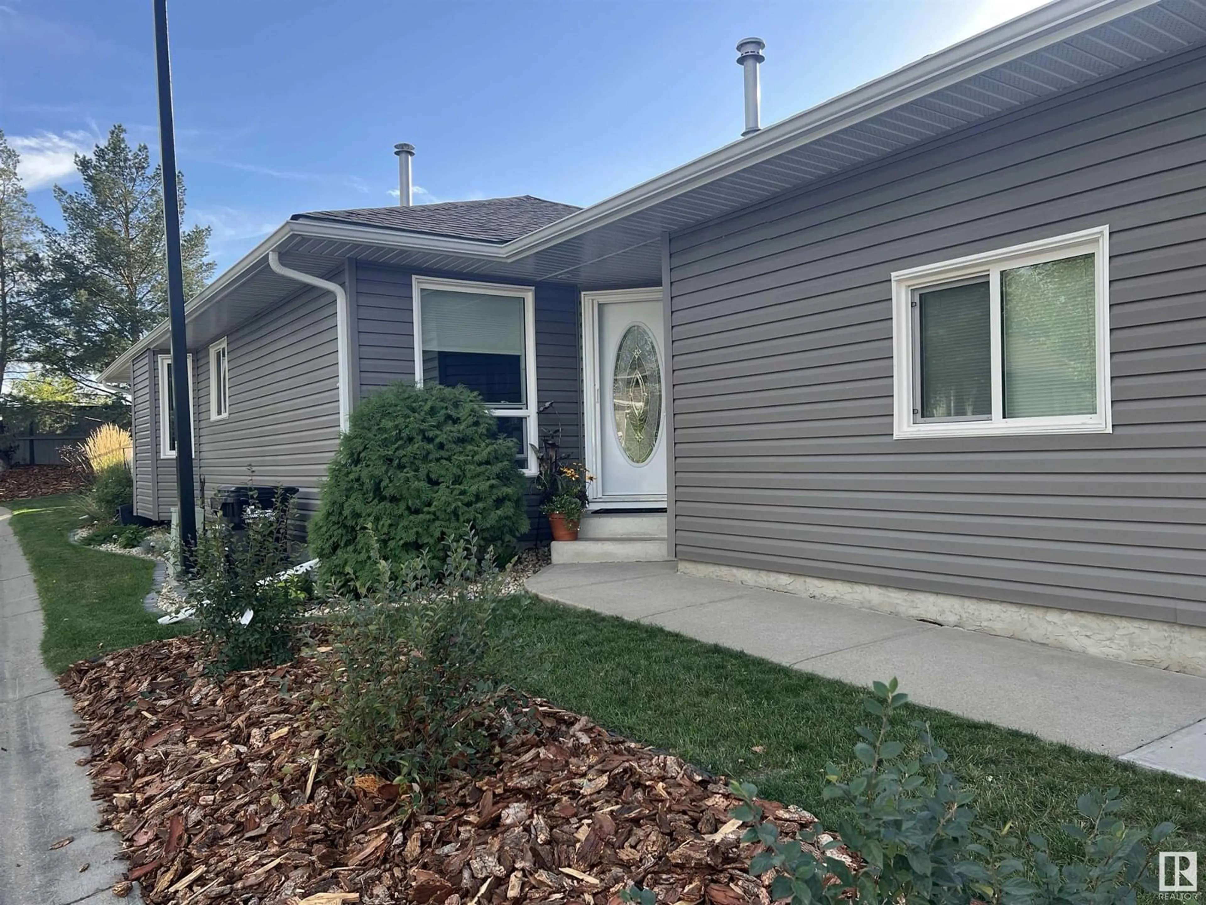 Home with vinyl exterior material, street for 38 49 Colwill BV, Sherwood Park Alberta T8A6C3