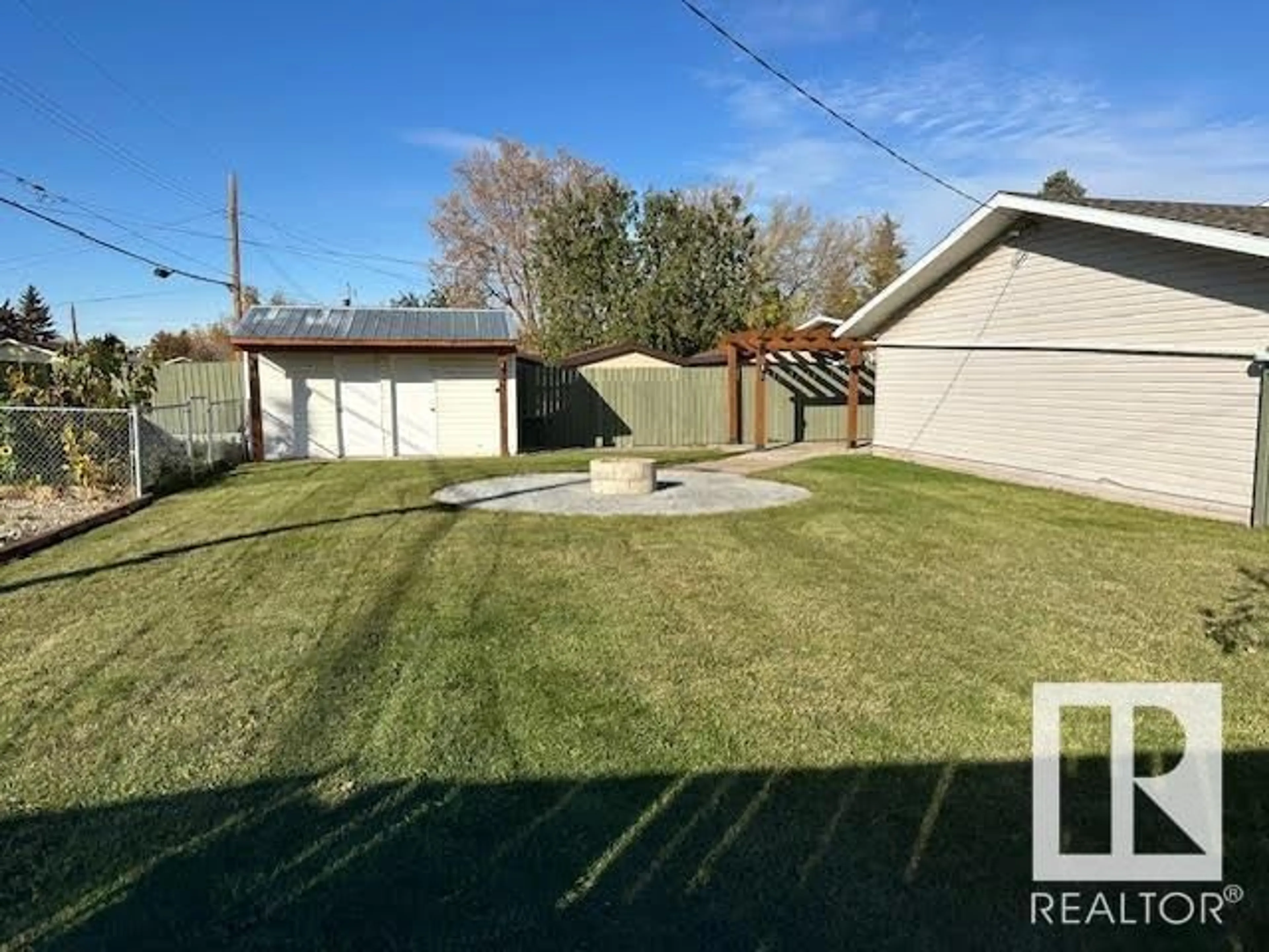 A pic from outside/outdoor area/front of a property/back of a property/a pic from drone, street for 5702 48A ST, Vegreville Alberta T9C0G7