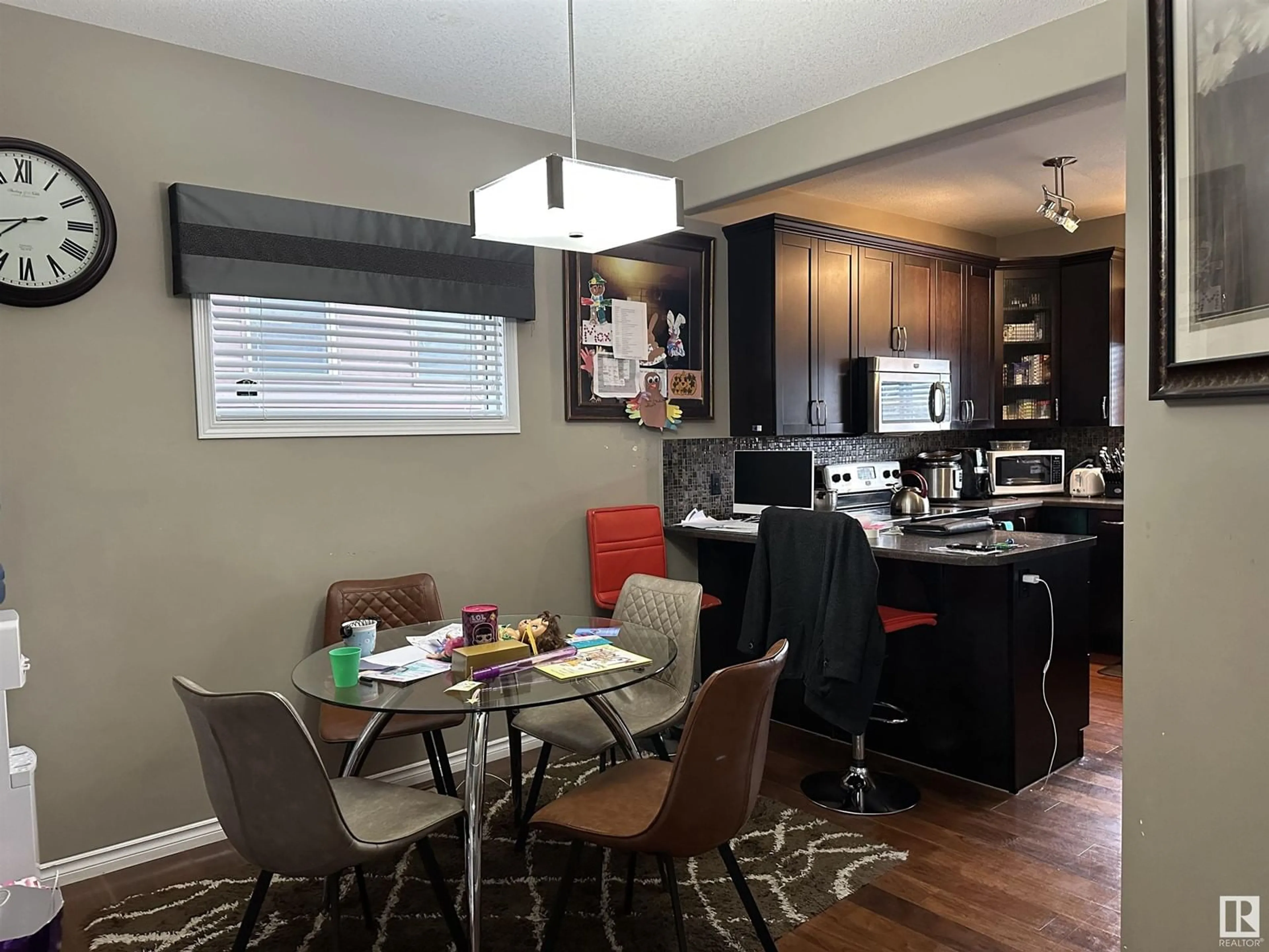 Open concept kitchen, wood/laminate floor for 857 CHAPPELLE LI SW, Edmonton Alberta T6W2B3