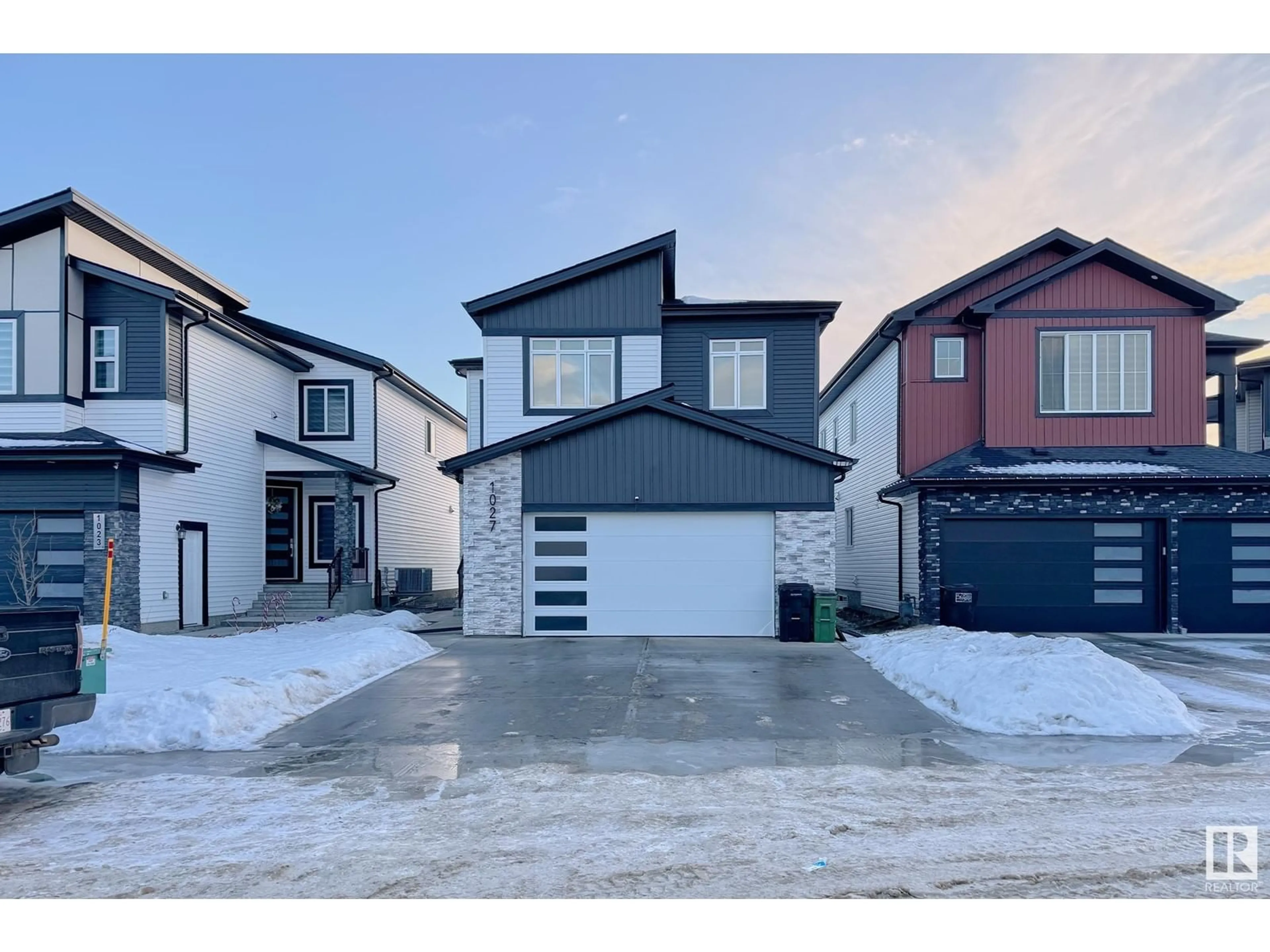 A pic from outside/outdoor area/front of a property/back of a property/a pic from drone, street for 1027 151 AV NW NW, Edmonton Alberta T5Y4C8