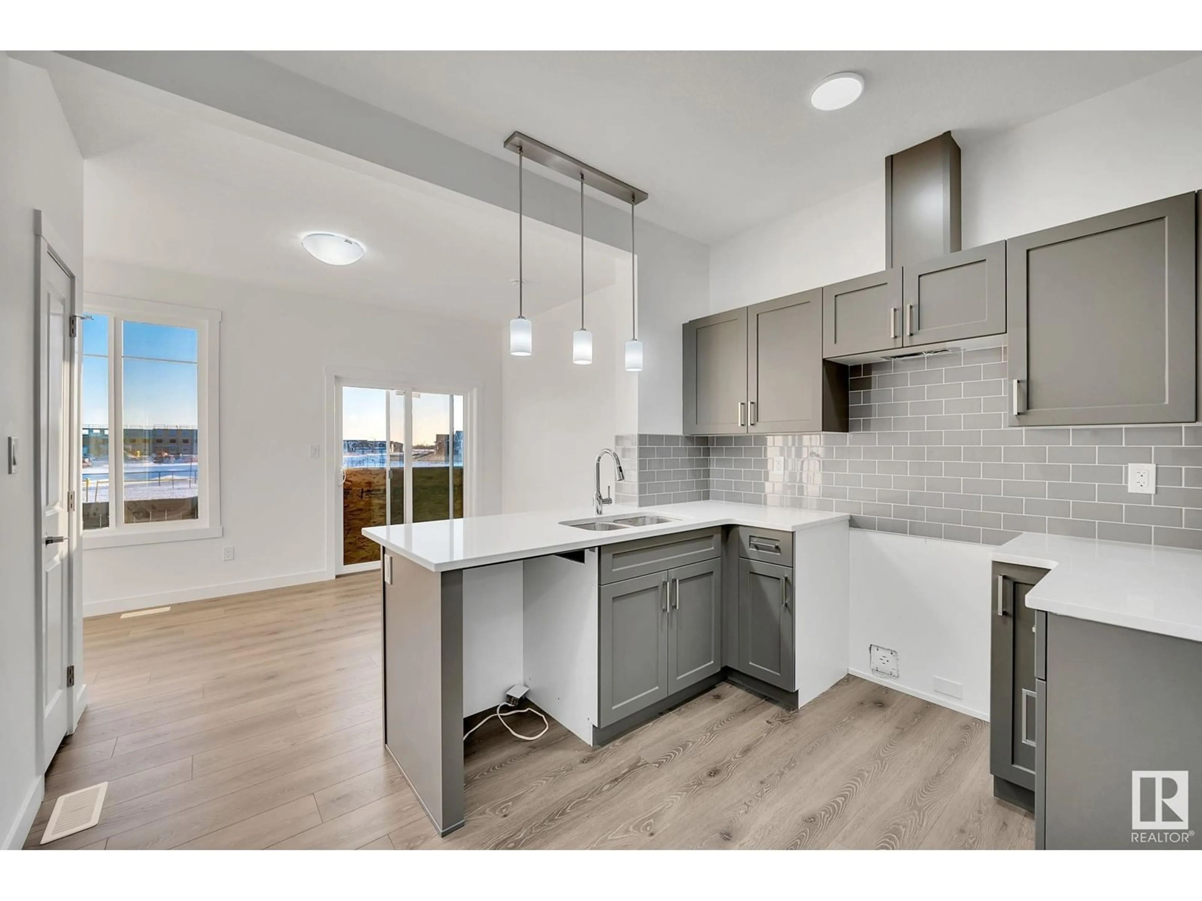 Open concept kitchen, unknown for #17 2710 66 st SW SW, Edmonton Alberta T6X3H4